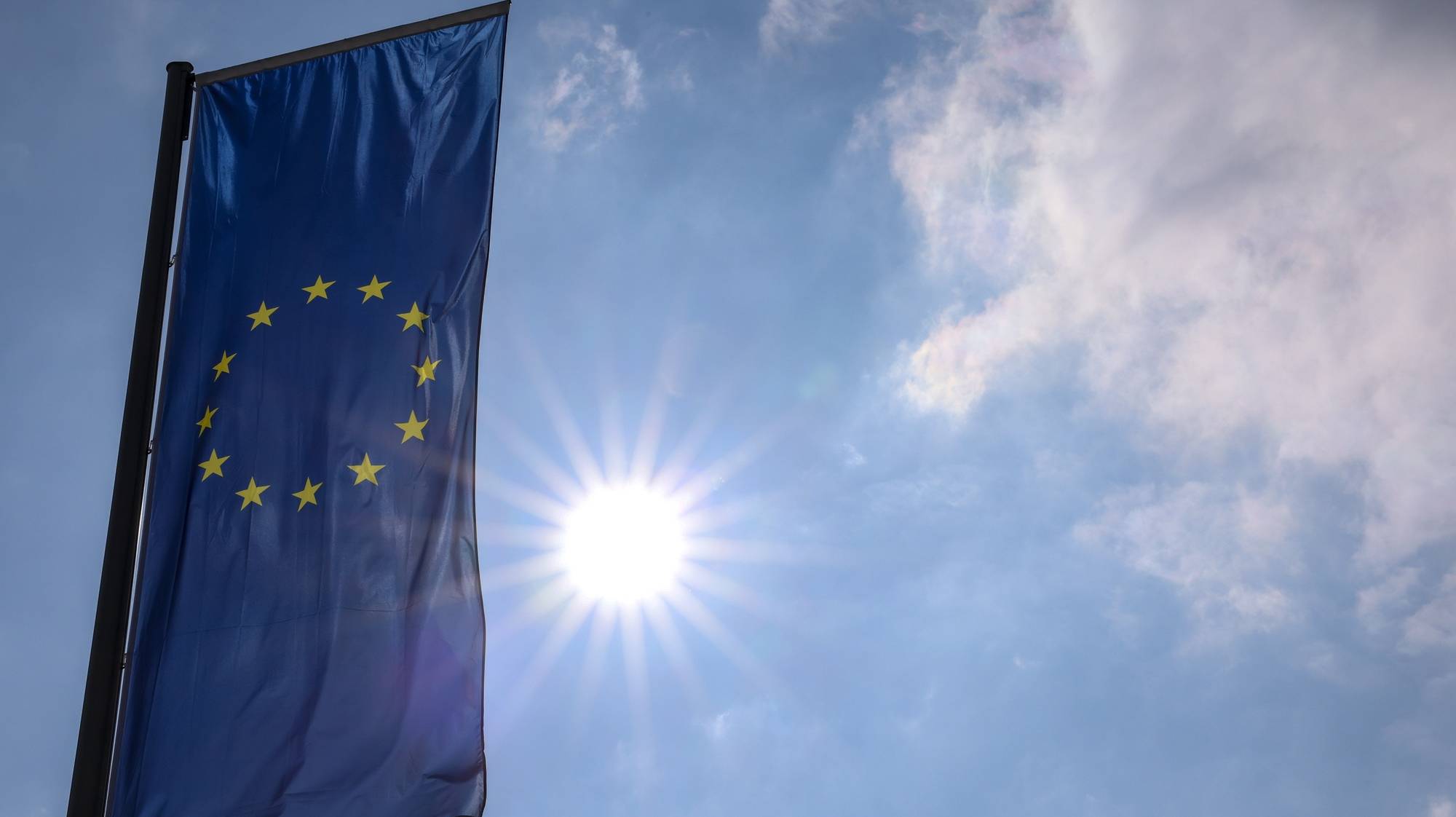 epa11204094 A European Union flag is seen outside of the European Central Bank (ECB) building before a press conference following the meeting of the ECB Governing Council in Frankfurt am Mainn, Germany, 07 March 2024.  EPA/CHRISTOPHER NEUNDORF