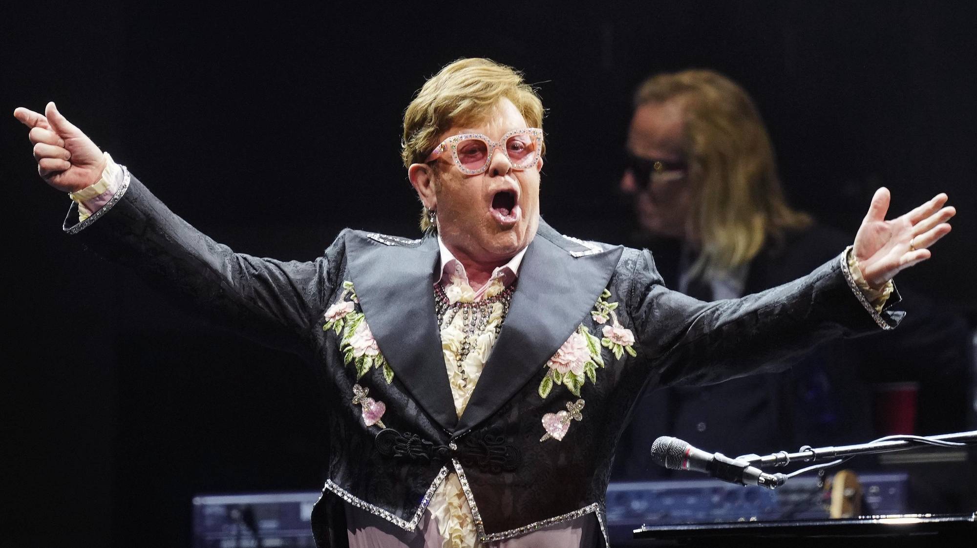 epa10646591 British singer Elton John performs during a concert at the Palau Sant Jordi arena in Barcelona, Spain, 22 May 2023. Elton John will perform twice in Barcelona, as part of his tour Farewell Yellow Brick Road.  EPA/ENRIC FONTCUBERTA