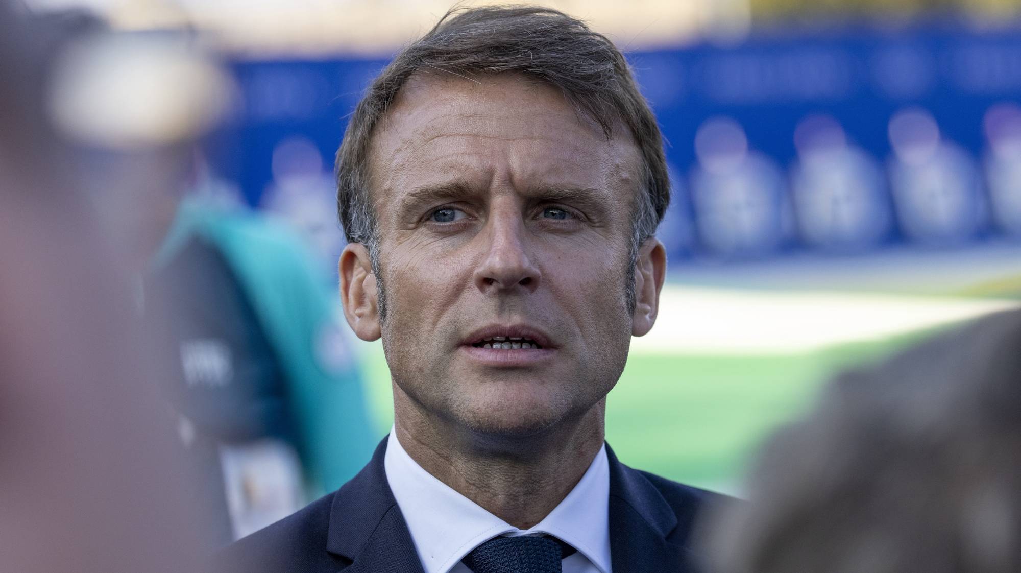 epa11520375 French President Emmanuel Macron speaks to journalists as he visits archery competitions at the Paris Olympic Games, at the Invalides in Paris, France, 02 August 2024.  EPA/ANDRE PAIN / POOL