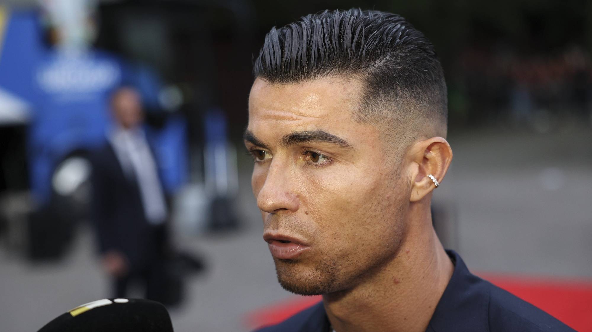 Portugal national soccer team player Cristiano Ronaldo talks to the press after arriving to Harsewinkel, Germany, 13 June 2024. The Portuguese national soccer team is based in Harsewinkel during the UEFA EURO 2024. MIGUEL A. LOPES/LUSA