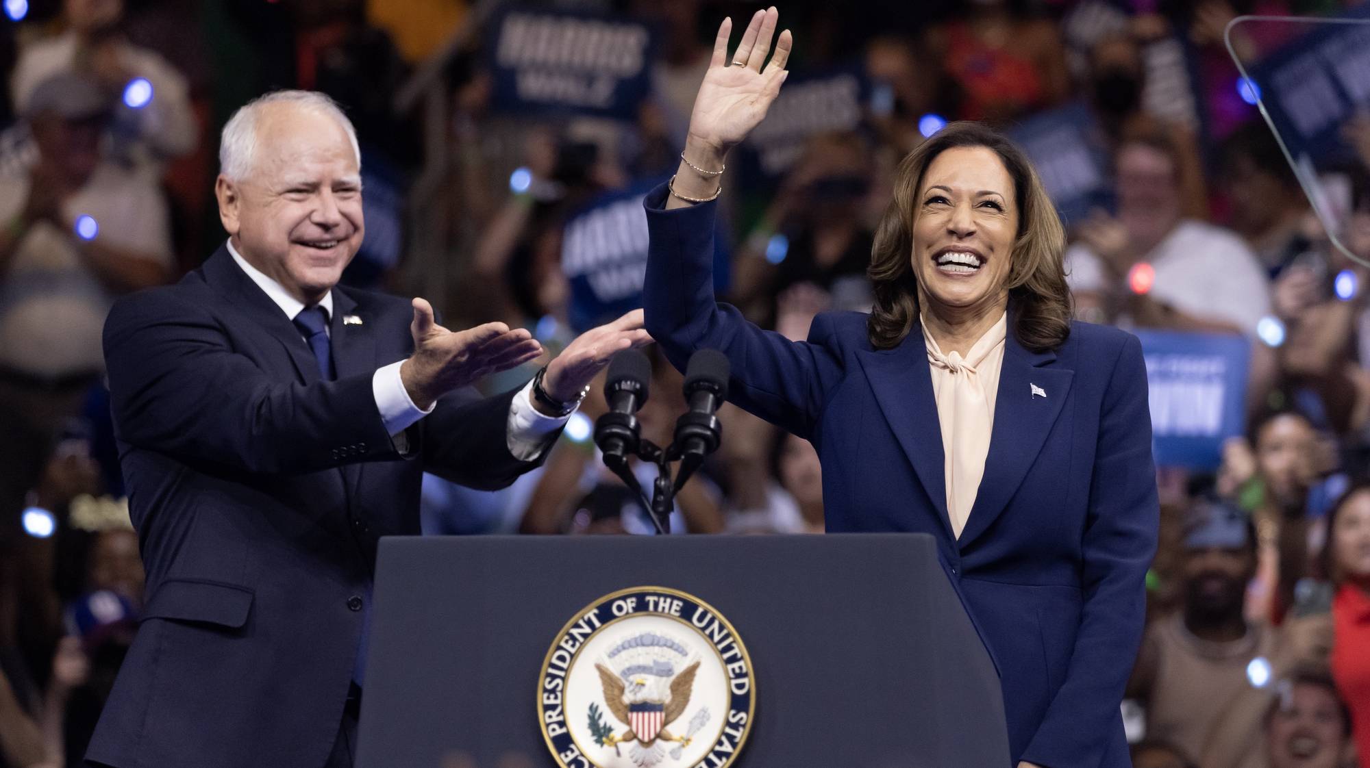 epa11532113 Democratic presidential candidate US Vice President Kamala Harris (R) holds a campaign rally with her new running mate Democratic vice presidential candidate Minnesota Governor Tim Walz (L) at the Liacouras Center at Temple University in Philadelphia, Pennsylvania, USA, 06 August 2024. Earlier, Harris announced Walz as her running mate for the 2024 presidential election and this is their first campaign event together.  EPA/MICHAEL REYNOLDS