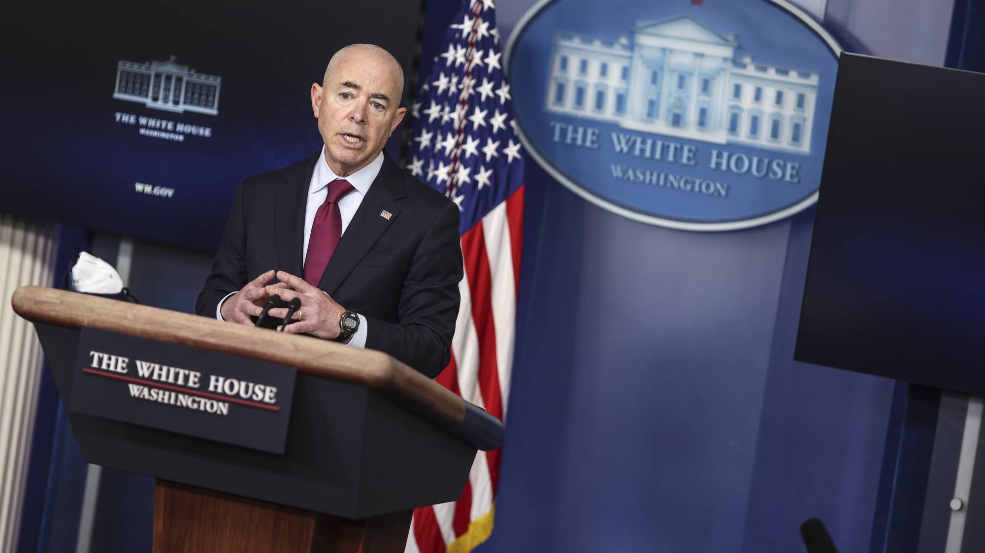 epa09045247 Homeland Security Secretary Alejandro Mayorkas talks to reporters during the daily press briefing in the Brady Press Briefing Room of the White House, in Washington, DC, USA, 01 March 2021.  EPA/Oliver Contreras / POOL