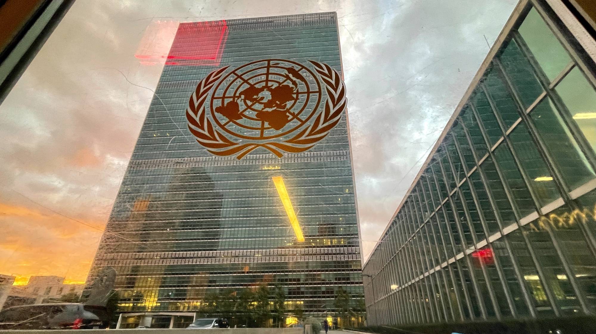 epa09479283 The United Nations headquarters building is seen from inside the General Assembly hall before heads of state begin to address the 76th Session of the U.N. General Assembly in New York City, USA, 21 September 2021.  EPA/EDUARDO MUNOZ / POOL