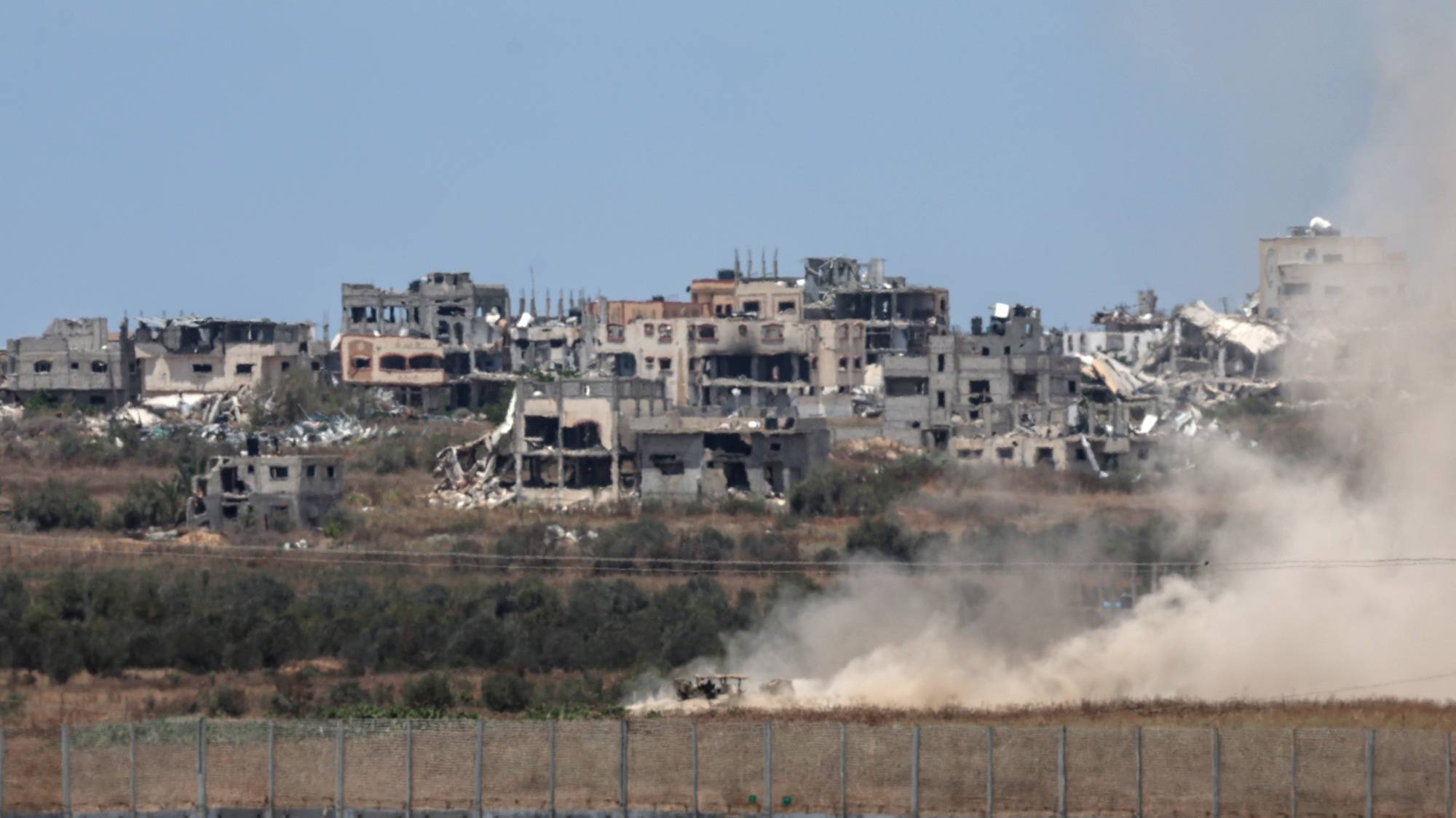 epaselect epa11444874 An Israeli military vehicle maneuvers in the Shejaiya area in the northern part of the Gaza Strip, as seen from the Israeli side of the border, at an unknown location, southern Israel, 29 June 2024. The Israeli military stated on 29 June that Israeli troops continued their &#039;operational activity against terror targets&#039; in the Shejaiya area and in the central and southern Gaza Strip. More than 37,000 Palestinians and over 1,400 Israelis have been killed, according to the Palestinian Health Ministry and the Israel Defense Forces (IDF), since Hamas militants launched an attack against Israel from the Gaza Strip on 07 October 2023, and the Israeli operations in Gaza and the West Bank which followed it.  EPA/ATEF SAFADI