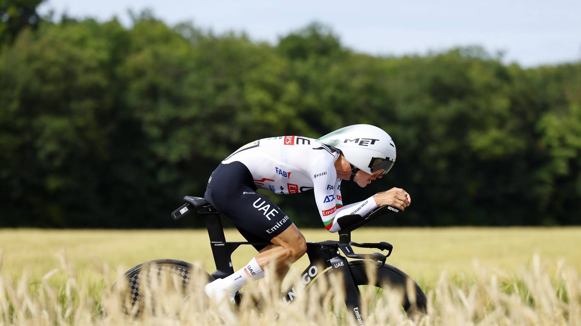 epa11459424 Portuguese rider Joao Almeida of UAE Team Emirates in action during the seventh stage of the 2024 Tour de France cycling race 25km individual time-trial (ITT) from Nuits-Saint-Georges to Gevrey-Chambertin, France, 05 July 2024.  EPA/KIM LUDBROOK