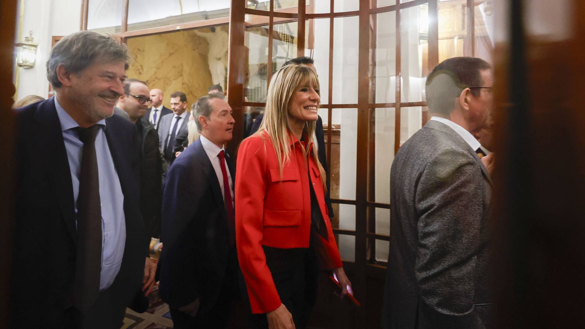 epa10978369 Begona Gomez (C), wife of Spanish Prime Minister-elect Pedro Sanchez (unseen), smiles as she leaves the building after Sanchez won the investiture&#039;s vote by an absolute majority at the Congress of Deputies, in Madrid, Spain, 16 November 2023. Acting Prime Minister got enough support to be re-elected as he achieved 179 votes with the support of Catalan and Basque pro-independent parties, among others, after he reached several agreements, including one agreement with Catalan Junts per Catalunya party for his leader Carles Puigdemont, residing in Belgium, is to be amnestied for his involvement in the unlawful independence referendum held in Catalonia in 2017, event that is causing several protests.  EPA/Javier Lizon