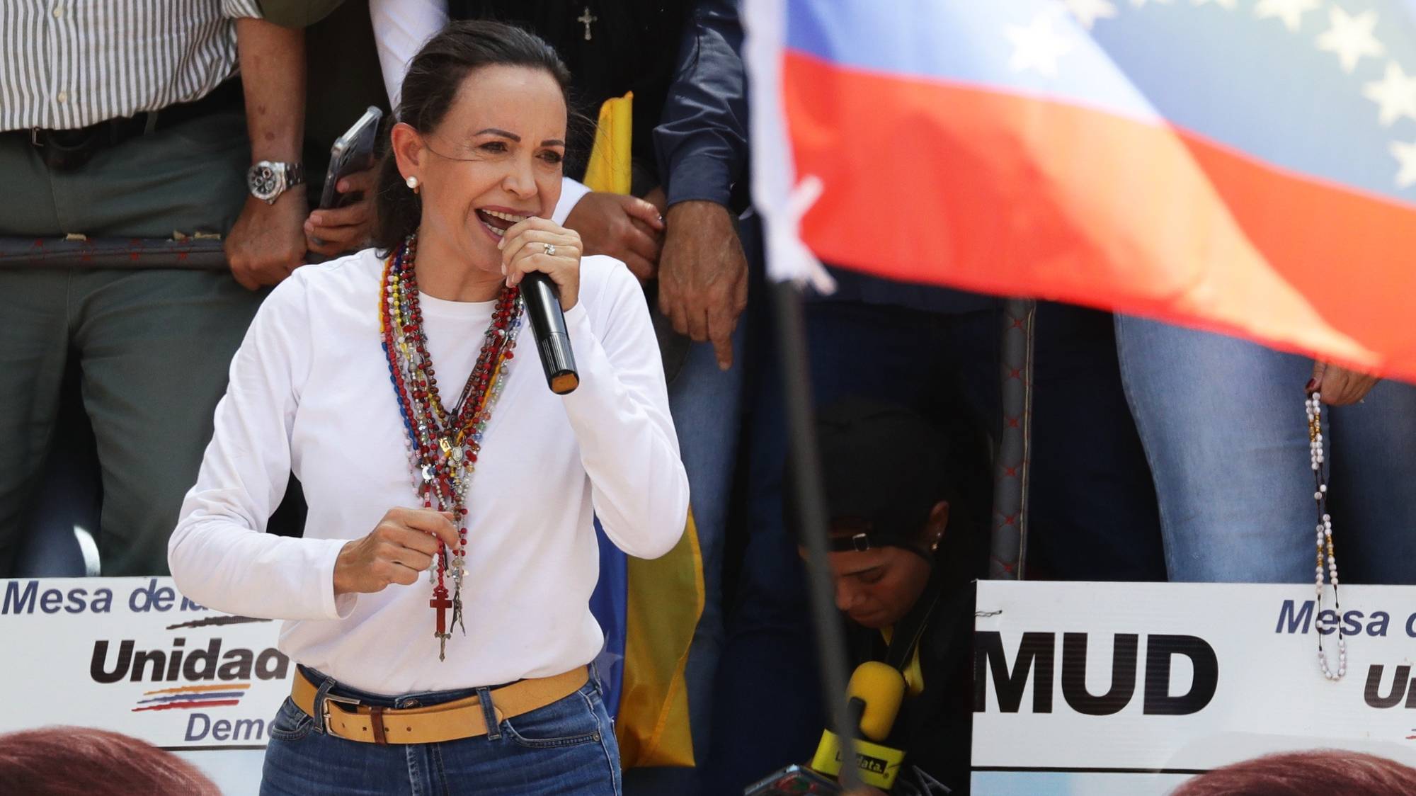 epa11523475 Venezuelan opposition leader Maria Corina Machado speaks at a protest against the official results of the country&#039;s 28 July presidential elections in Caracas, Venezuela, 03 August 2024. The Venezuelan National Electoral Council (CNE) on 02 August 2024 proclaimed Nicolas Maduro as re-elected president of Venezuela.  EPA/RONALD PENA R.