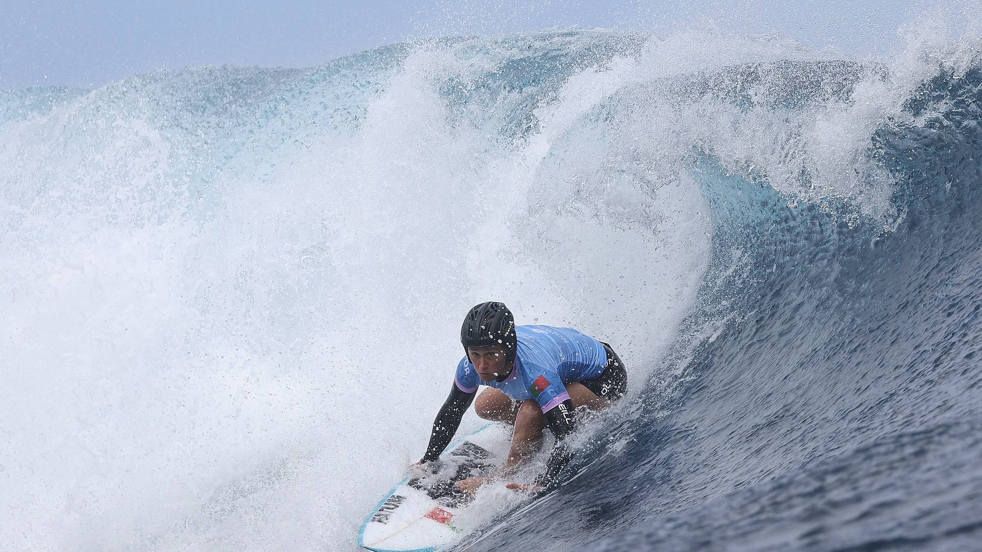 epa11517770 Yolanda Hopkins of Portugal in action during Women round 3 of the Surfing competitions in the Paris 2024 Olympic Games, in Teahupo&#039;o, Tahiti, 01 August 2024.  EPA/FAZRY ISMAIL