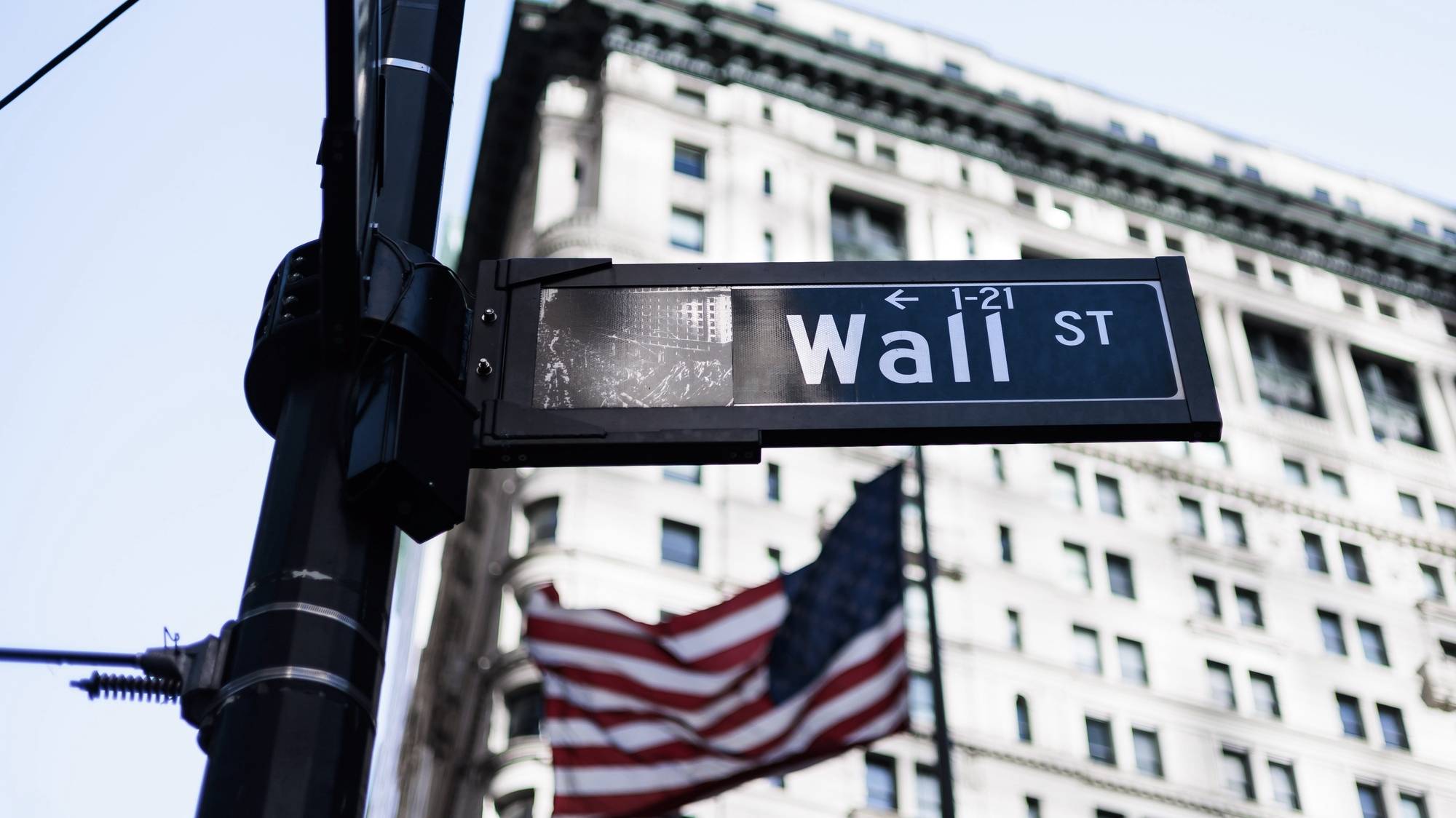 epa10508336 A sign for Wall Street near New York Stock Exchange in New York, New York, USA, 07 March 2023. The Dow Jones industrial average lost 574 points on 07 March following comments by the US Federal Reserve Chairman during testimony to the US Congress that the central bank will likely raise interest rates more that initially anticipated in an effort to lower inflation.  EPA/JUSTIN LANE