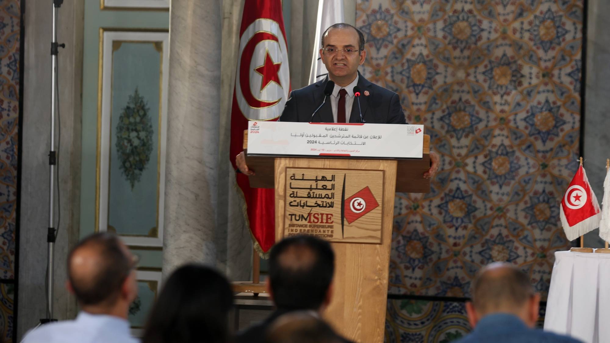 epa11543864 President of the Independent High Authority for Elections Farouk Bouasker speaks during a press conference, to announce preliminary candidates for the 06 October 2024 presidential election, in Tunis, Tunisia 10 August 2024. Bouasker, said that the Authority had previously received 17 files of potential candidates, that seven were called to complete their sponsorship files and that only five did so on time. After examining all the files, only three candidates were selected. Zouhair Maghzaoui Secretary General of the People&#039;s Movement, Ayachi Zammel former MP and Secretary General of the Azimoun party and the current Tunisian President Kais Saied.  EPA/MOHAMED MESSARA