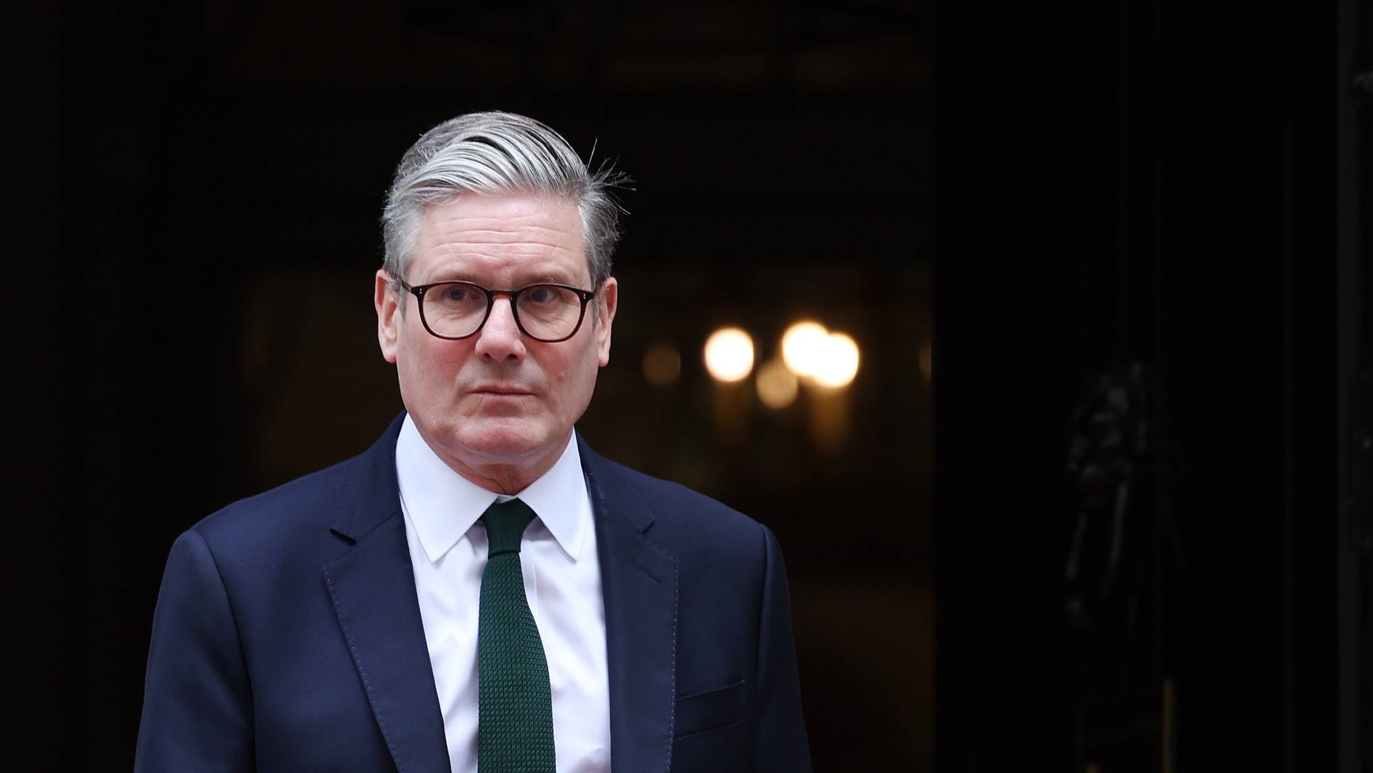 epa11529682 British Prime Minister Keir Starmer waits to welcome the Sultan of Oman to Downing Street in London, Britain, 06 August 2024.  EPA/ANDY RAIN