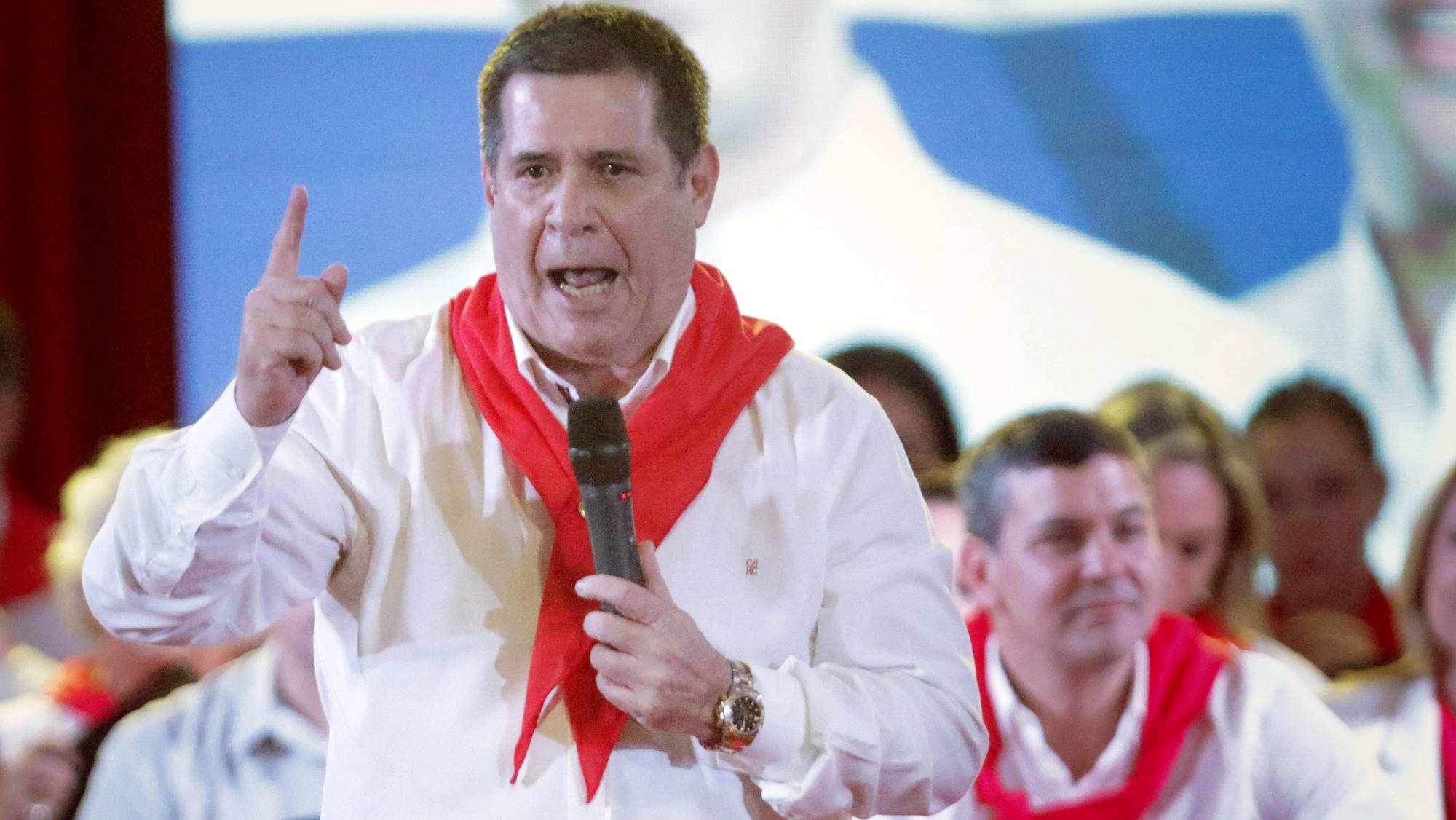 epa10590108 Former president of Paraguay and president of the ruling Colorado Party, Horacio Cartes speaks during an event called &#039;Great closing campaign for women from list 1&#039; at the party&#039;s headquarters, in Asuncion, Paraguay, 24 April 2023. The pro-government Colorado Party of Paraguay announced that it has brought together 70,000 electoral representatives to monitor and take care of the transmission of the results of the general elections on 30 April.  EPA/Rubén Peña