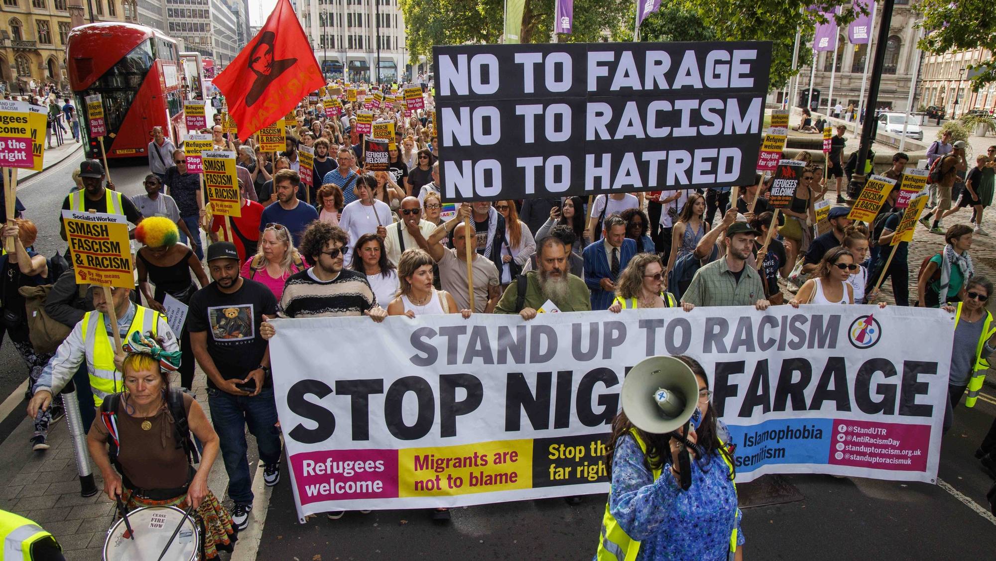 epa11543120 Stop the Far Right protestors gather outside the Reform UK headquarters in London, Britain, 10 August 2024. The demonstration is part of a national day of protest to stop the far right in the UK. Violent demonstrations have been held by members of far-right groups across Britain following a fatal stabbing attack in Southport, in which three children were killed and eight more seriously injured, along with two adults.  EPA/MARK THOMAS