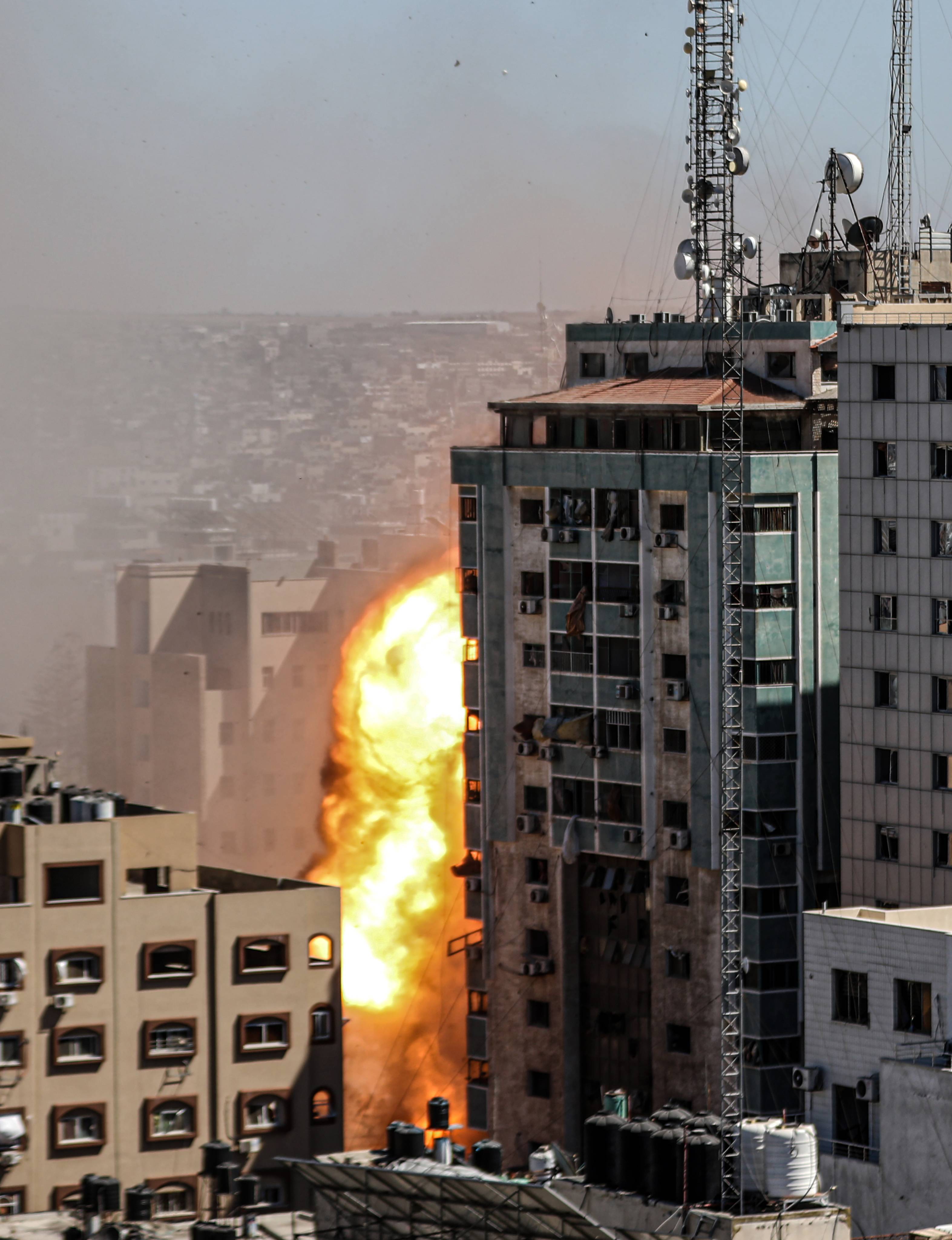 Israeli forces destroy building in Gaza City where Al-Jazeera, Associated Press had their offices