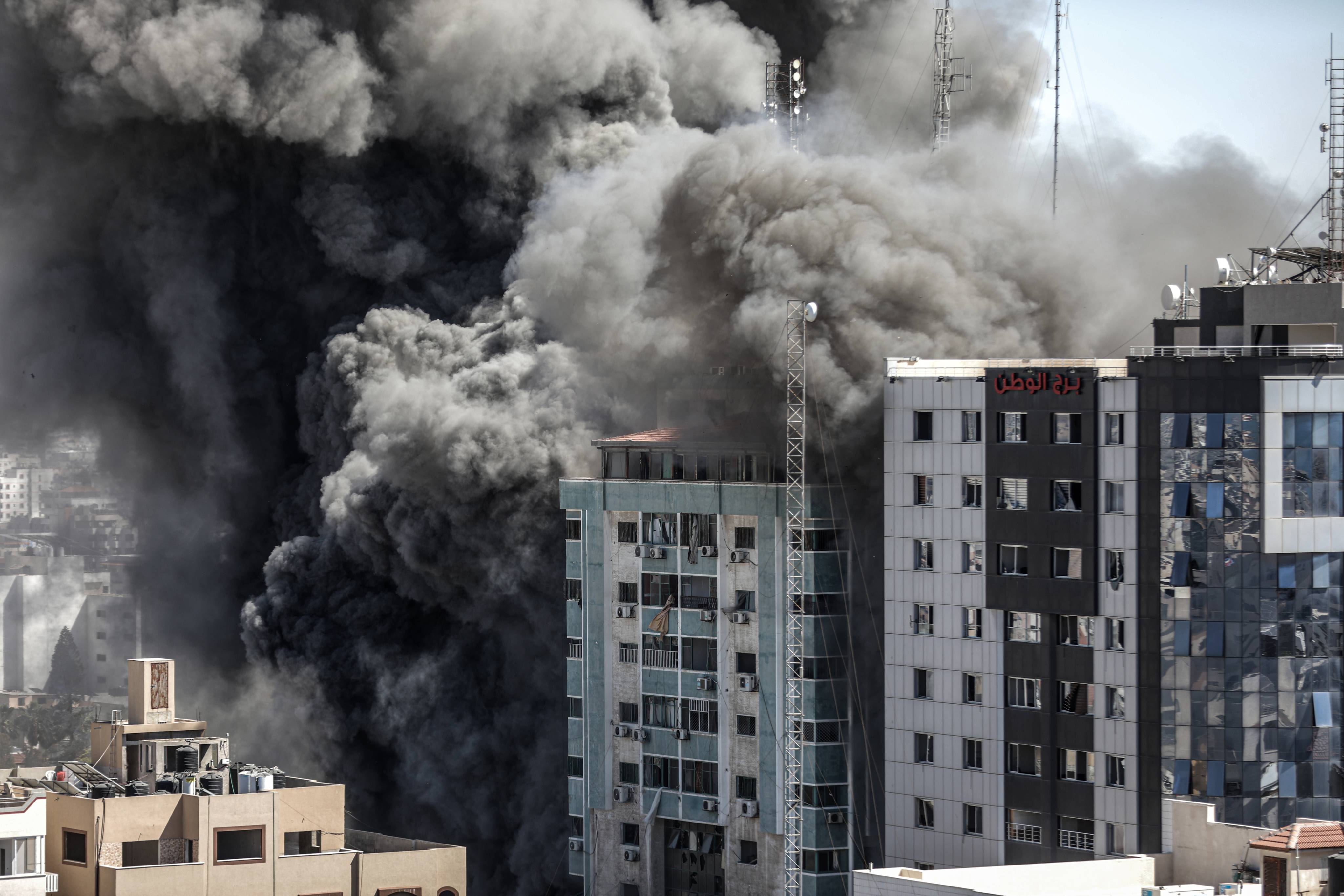 Israeli forces destroy building in Gaza City where Al-Jazeera, Associated Press had their offices