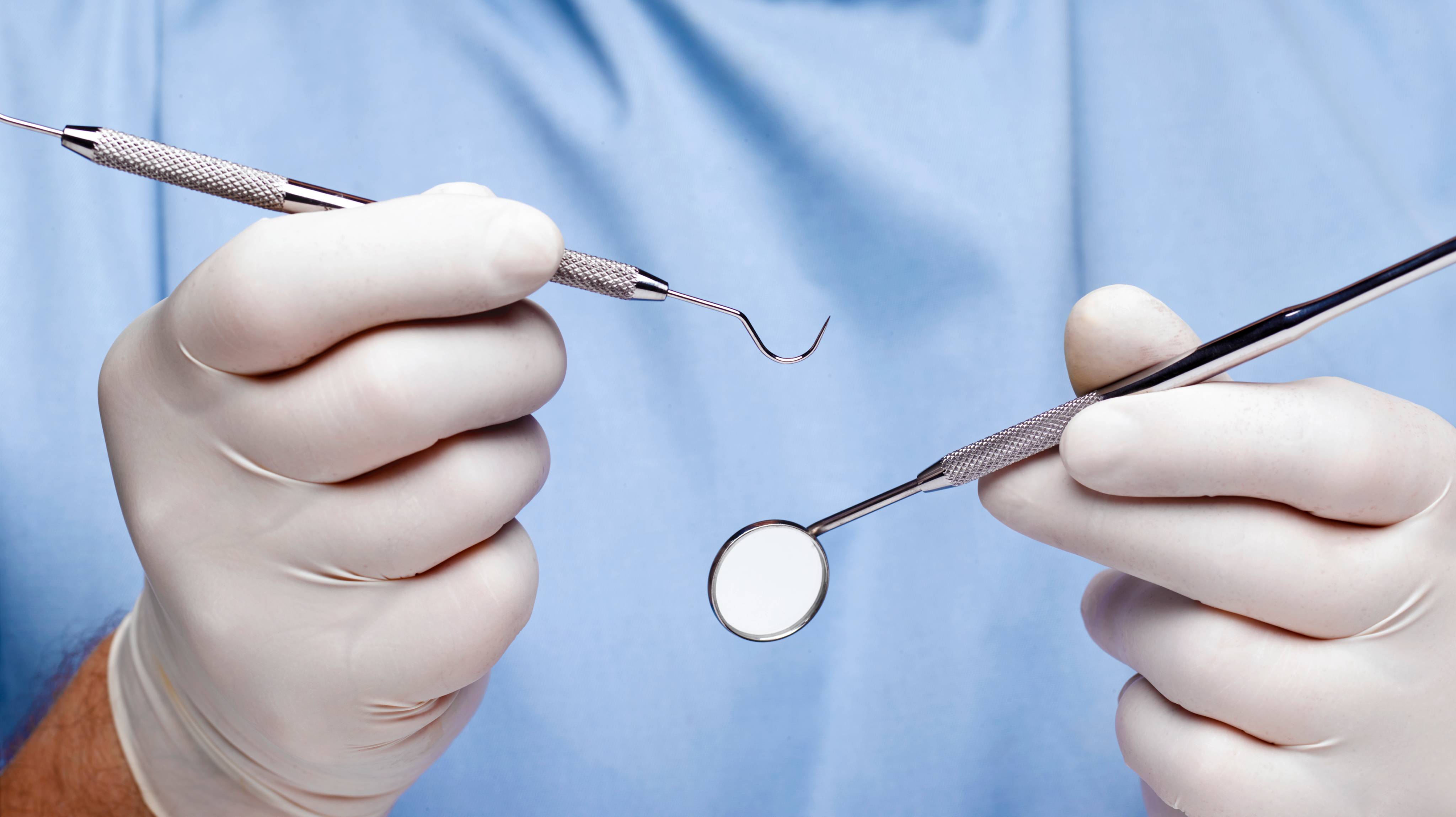 Dentist doing dental examination