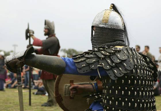 SYDNEY, AUSTRALIA - DECEMBER 02:  Members of the Danelaw Medieval Fighting Society wait for battle during the Sydney Medieval Fayre at Castle Hill Showground December 2, 2006 in Sydney, Australia. The Sydney Medieval Fayre runs for two days with over 300 performers re-enacting medieval battles form various ages using authentic weapons and wearing traditional armoury.  (Photo by Cameron Spencer/Getty Images)