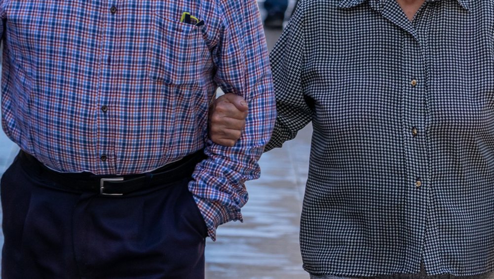 Senior people walking in Barcelona Spain during COVID Lockdown