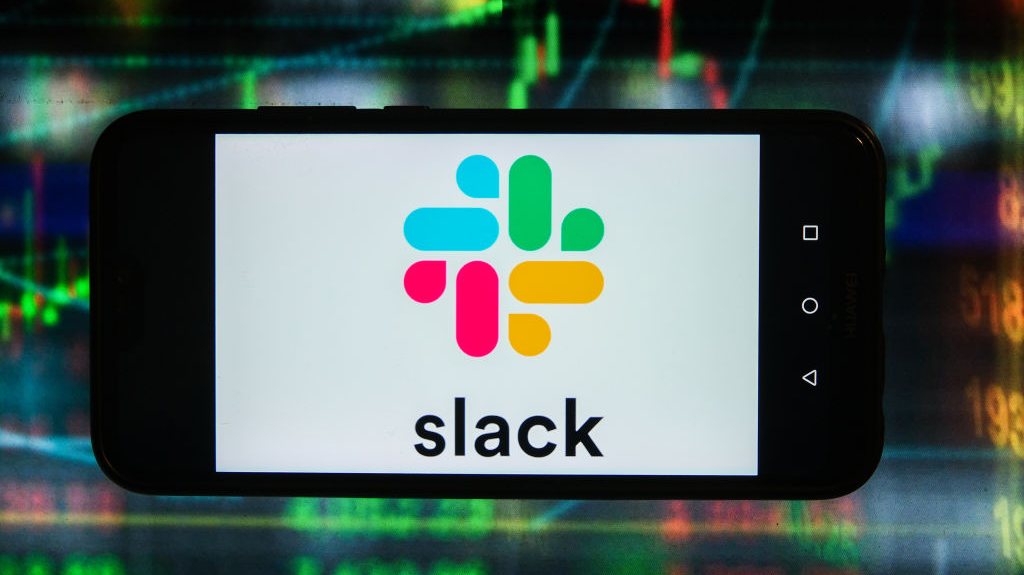In this photo illustration a Slack logo is displayed on a