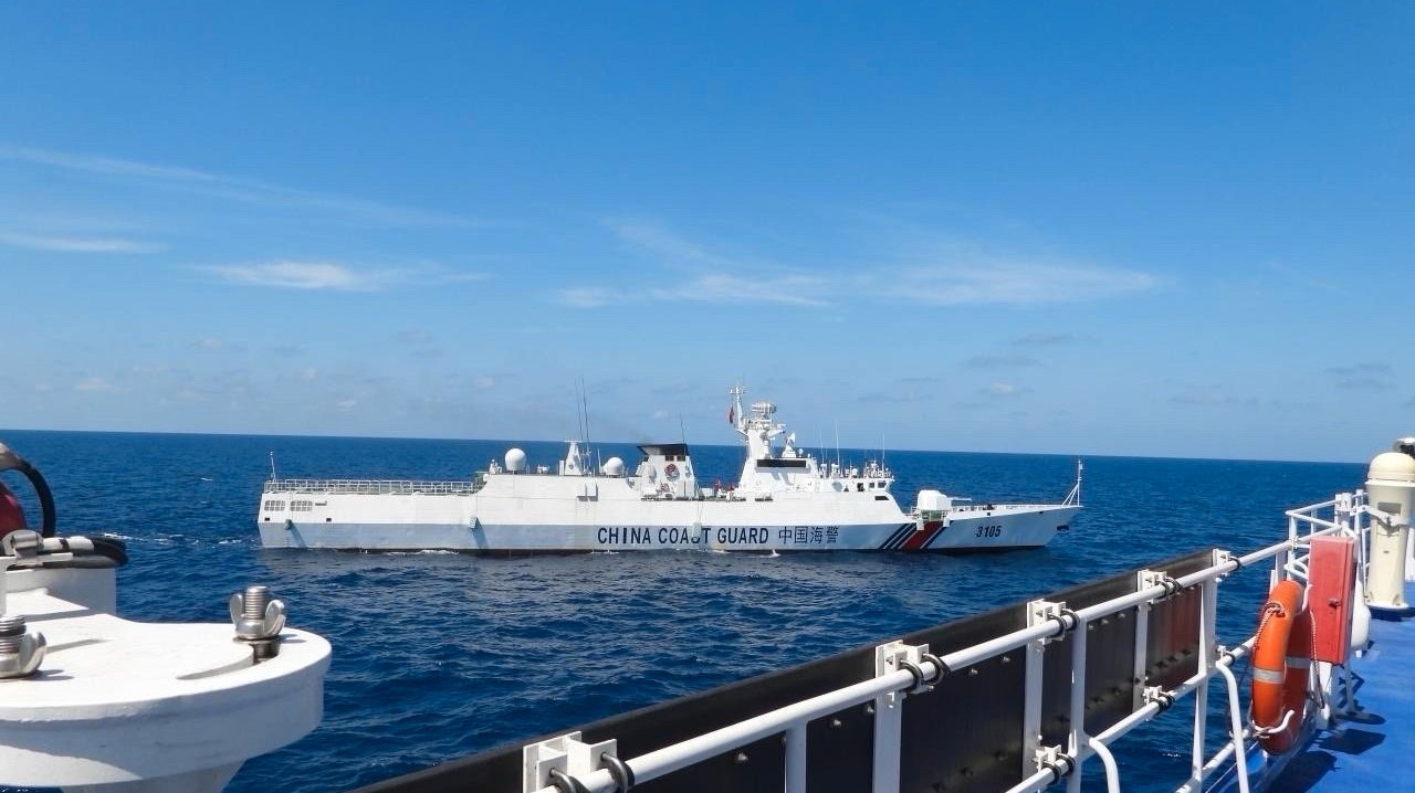 epa11144583 A handout photo made available by the Philippine Coast Guard (PCG) shows China Coast Guard (CCGV-3105) patrol ship maneuvering near Philippine Coast Guard vessel BRP Teresa Magbanua (MRRV-9701) at the vicinity of Scarborough Shoal, Philippines, in the disputed waters of the South China Sea, on 08 February 2024 (issued on 11 February 2024). According to a report from the Philippine Coast Guard (PCG), on 08 February, a China Coast Guard (CCGV-3105) patrol ship conducted a blocking and dangerous maneuver by passing through from port beam to dead ahead of the Philippine Coast Guard BRP Teresa Magbanua (MRRV-9701) vessel. The South China Sea dispute has been ongoing for several years with China, the Philippines, Vietnam, Malaysia, Brunei, and Taiwan, all fighting for sovereignty in the maritime region.  EPA/PHILIPPINE COAST GUARD HANDOUT  HANDOUT EDITORIAL USE ONLY/NO SALES HANDOUT EDITORIAL USE ONLY/NO SALES