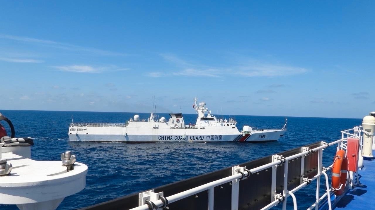 epa11144583 A handout photo made available by the Philippine Coast Guard (PCG) shows China Coast Guard (CCGV-3105) patrol ship maneuvering near Philippine Coast Guard vessel BRP Teresa Magbanua (MRRV-9701) at the vicinity of Scarborough Shoal, Philippines, in the disputed waters of the South China Sea, on 08 February 2024 (issued on 11 February 2024). According to a report from the Philippine Coast Guard (PCG), on 08 February, a China Coast Guard (CCGV-3105) patrol ship conducted a blocking and dangerous maneuver by passing through from port beam to dead ahead of the Philippine Coast Guard BRP Teresa Magbanua (MRRV-9701) vessel. The South China Sea dispute has been ongoing for several years with China, the Philippines, Vietnam, Malaysia, Brunei, and Taiwan, all fighting for sovereignty in the maritime region.  EPA/PHILIPPINE COAST GUARD HANDOUT  HANDOUT EDITORIAL USE ONLY/NO SALES HANDOUT EDITORIAL USE ONLY/NO SALES