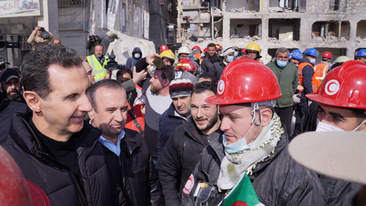 epa10459129 A handout photo made available by Syrian Presidential Office shows Syrian President Bashar al-Assad (L) visiting the site struck by earthquake in Aleppo, Syria, 10 February 2023. According to the Syrian Presidential office, al-Assad on 10 February visited a site where rescue teams are working to remove rubble, rescue survivors and remove the bodies of victims as well as visiting people receiving medical treatment at Aleppo University Hospital. More than 21,000 people have died and thousands more are injured after two major earthquakes struck southern Turkey and northern Syria on 06 February. Authorities fear the death toll will keep climbing as rescuers look for survivors across the region.  EPA/SYRIAN PRESIDENTIAL OFFICE HANDOUT  HANDOUT EDITORIAL USE ONLY/NO SALES