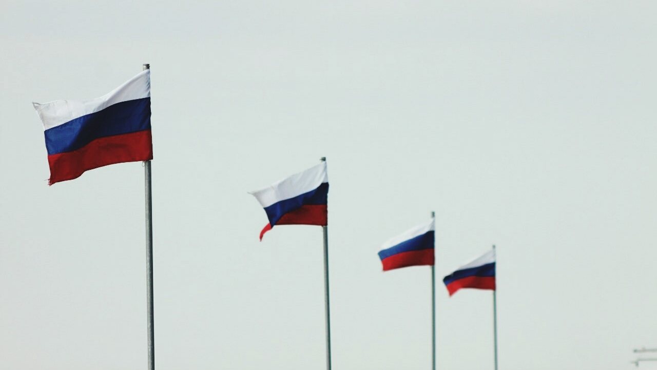 Low Angle View Of Russian Flag Against Sky