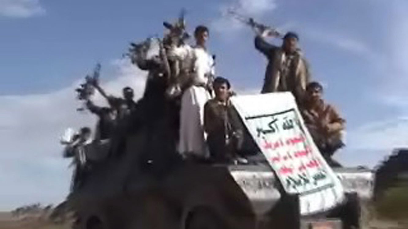 epa01840509 An undated video grab distributed on 28 August 2009 by the office of Abdel Malek al-Huthi, the leader of Yemen&#039;s Zaidi rebels, allegedly shows members of the group, that is also known as al-Huthis. They are posing with their guns atop a military vehicle which they allegedly seized from the Yemeni army during battles the northwestern Saada province.  EPA/AL-HUTHI GROUP HANDOUT BEST QUALITY AVAILABLE