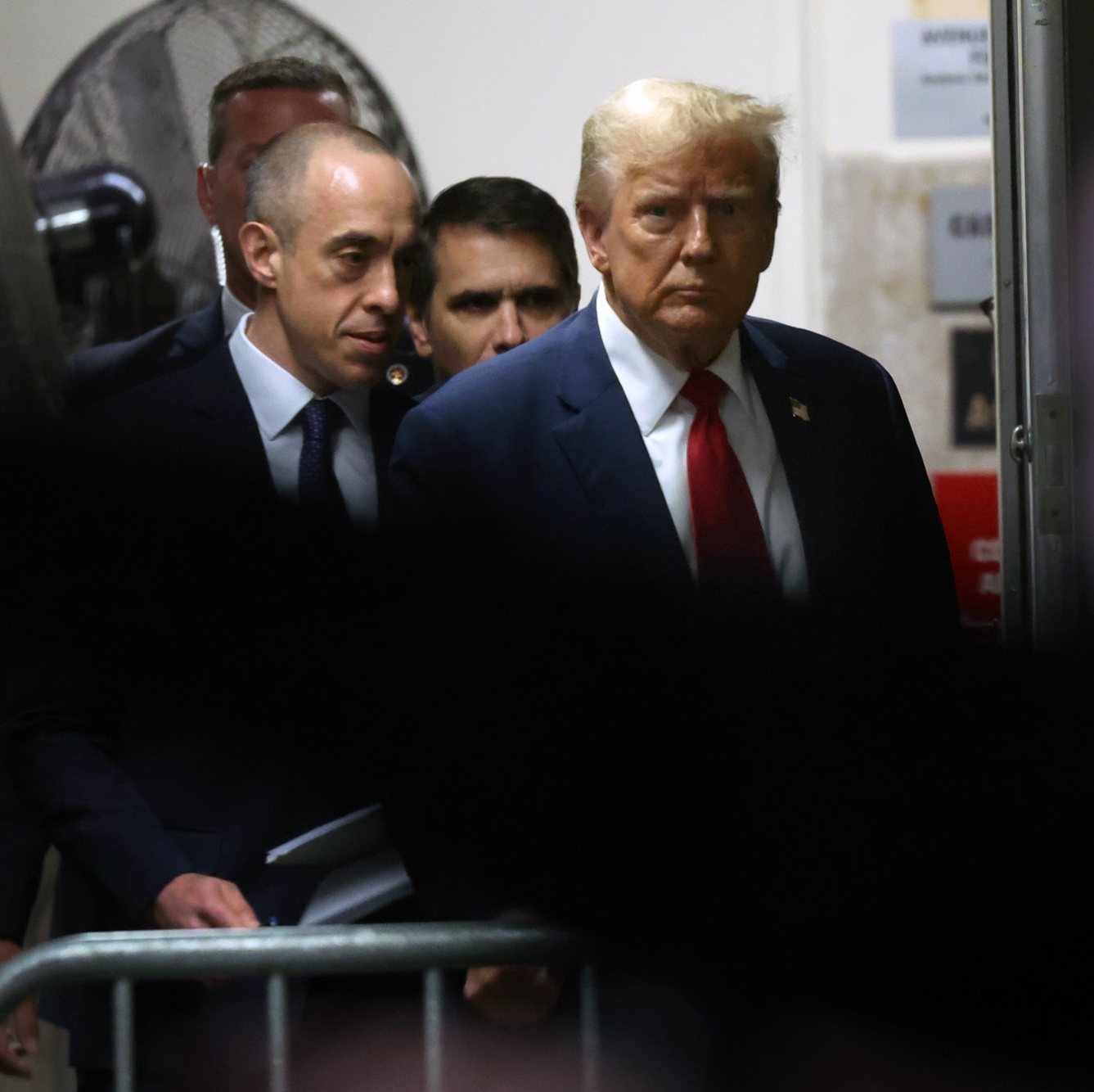 epa11300536 Former US President Donald Trump re-enters Manhattan Criminal Court for the continuation of his hush money trial, in New York, USA, 25 April 2024. Trump is facing 34 felony counts of falsifying business records related to payments made to adult film star Stormy Daniels during his 2016 presidential campaign.  EPA/Spencer Platt / POOL