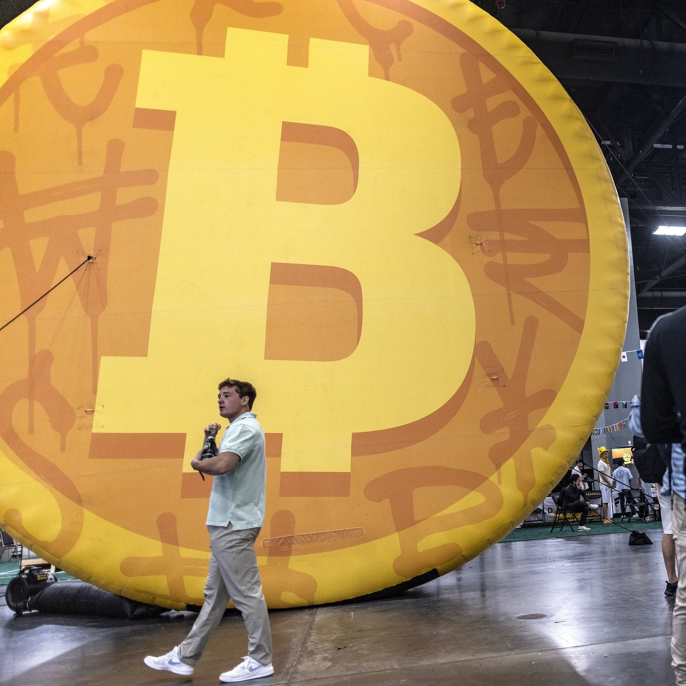 epa10637199 People attend the Bitcoin 2023 conference at the Miami Beach Convention Center in Miami Beach, Florida, USA, 18 May 2023. Bitcoin 2023 is the biggest bitcoin event in the world that features, for its 2023 edition, about 150 speakers and a showcase of more than 2,000 companies.  EPA/CRISTOBAL HERRERA-ULASHKEVICH
