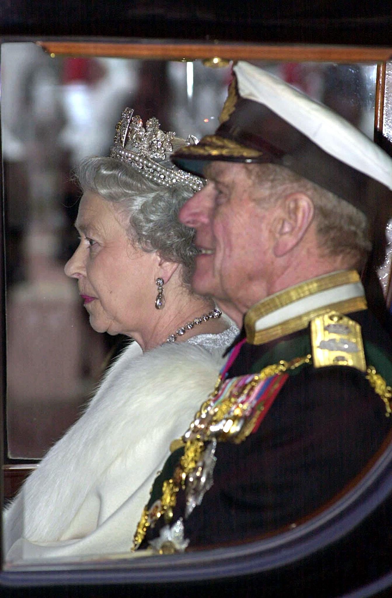 Queen Elizabeth II and the Duke of Edinburgh depar