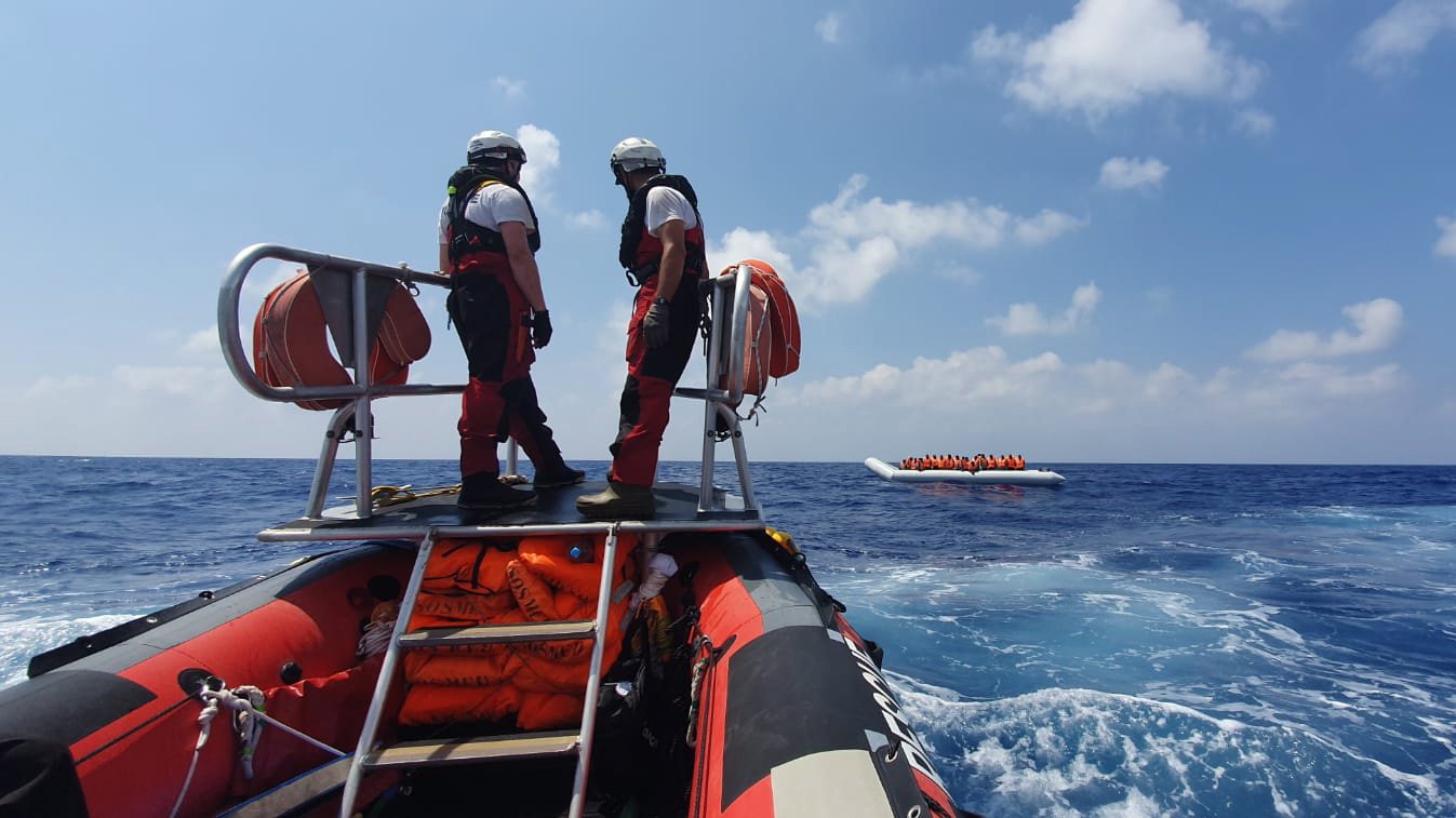 epa07780654 A handout photo dated 09 August 2019 and  made available by Doctors Without Borders (MSF) on 19 August 2019, showing rescue vessel Ocean Viking crew members approaching a boat with migrants off the coast of Libya in the Mediterranean. The vessel, that has been at sea since 10 days, rescued a total of 356 migrants in three rescue missions. Over 500 refugees on two NGO vessels are still waiting to be allowed at land while Italy and Malta have denied them access to their harbors.  EPA/HANNAH WALLACE BOWMAN HANDOUT  HANDOUT EDITORIAL USE ONLY/NO SALES