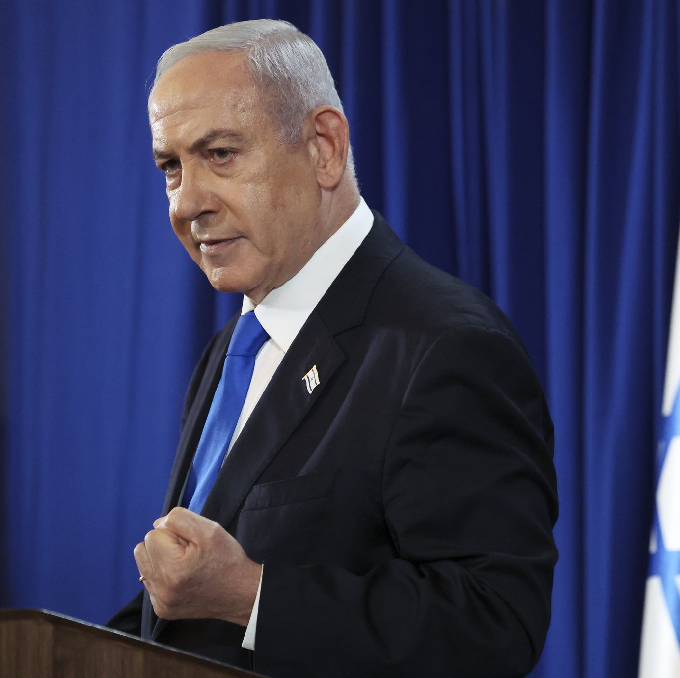 epa11476530 Israeli Prime Minister Benjamin Netanyahu gestures during a press conference amid the ongoing conflict in Gaza between Israel and Hamas, in Tel Aviv, Israel, 13 July 2024.  EPA/NIR ELIAS / POOL