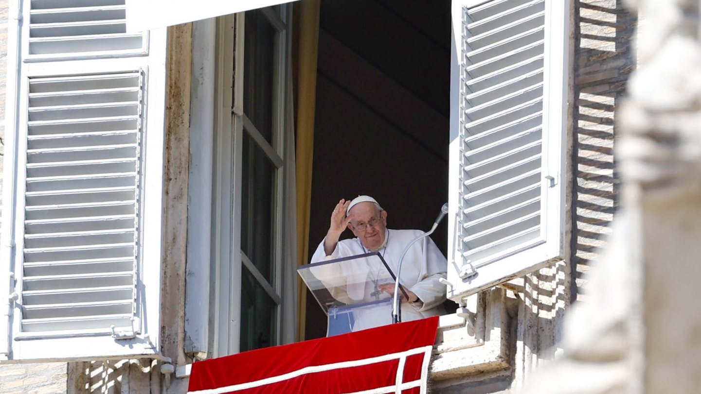 epa10516620 Pope Francis waves from the window of his office overlooking St. Peter&#039;s Square during the Angelus prayer, Vatican City, 12 March 2023.  EPA/FABIO FRUSTACI