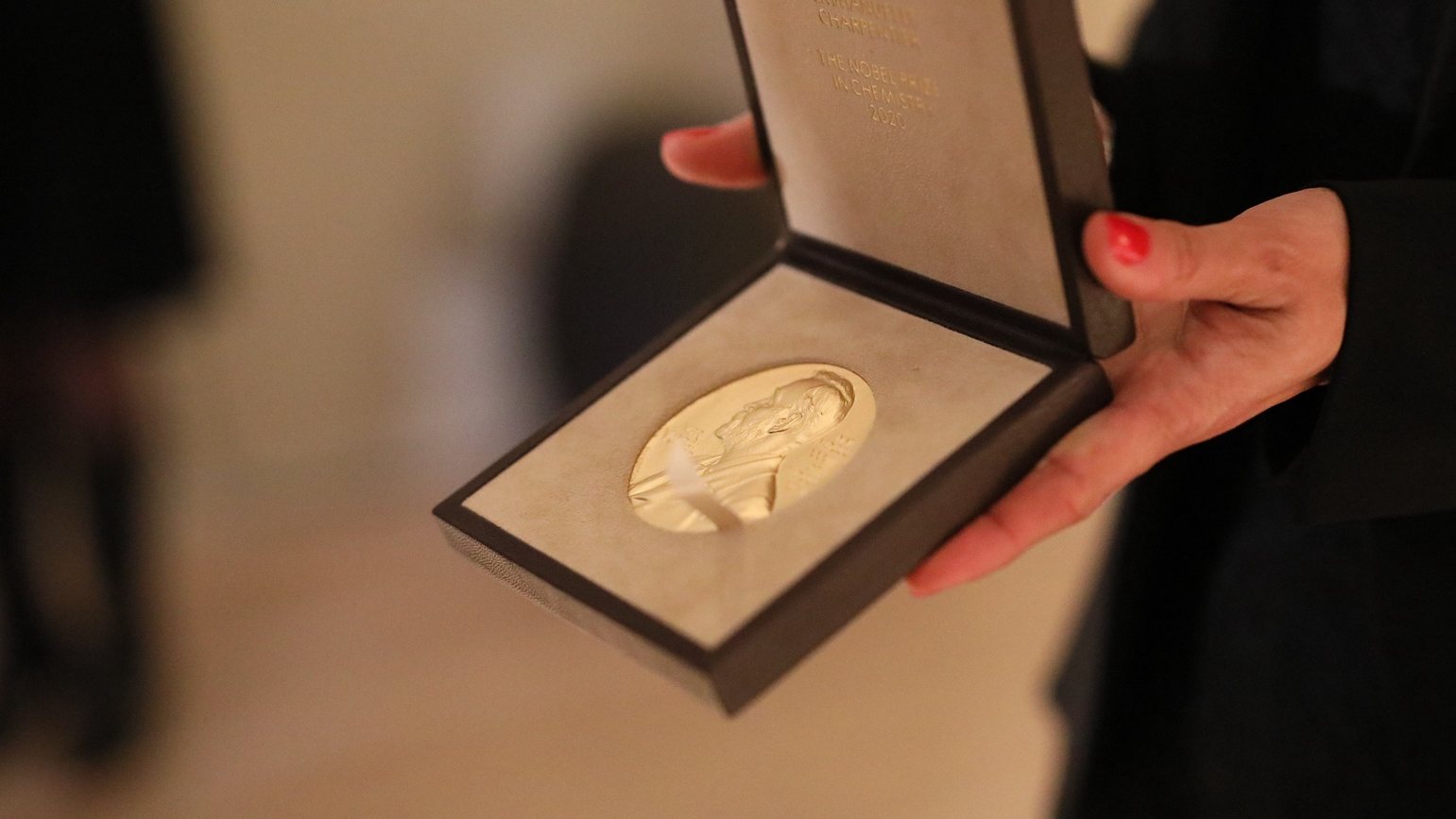 epa08869369 A handout photo made available by The Nobel Prize shows the Nobel Prize medal and diploma being presented to chemistry laureate Emmanuelle Charpentier at the Swedish Ambassador&#039;s Residence in Berlin, Germany, 07 December 2020.  EPA/BERNHARD LUDEWIG / THE NOBEL PRIZE HANDOUT MANDATORY CREDIT: THE NOBEL PRIZE HANDOUT EDITORIAL USE ONLY/NO SALES