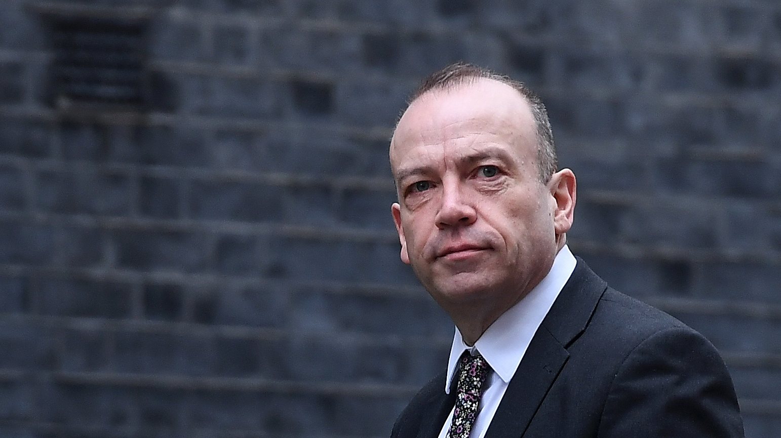 epa10481666 British Secretary of State for Northern Ireland Chris Heaton-Harris arrives at 10 Downing Street for a cabinet meeting, in London, Britain, 21 February  2023.  EPA/ANDY RAIN