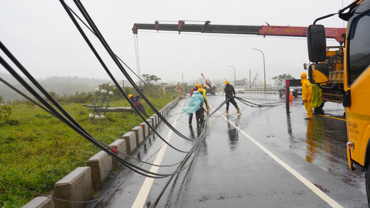 epa10901278 A handout photo made available by Taiwan Power Company via The Ministry of Economic Affairs of Taiwan shows workers repairing damaged electric power lines brought by typhoon Koinu in Pingtung county, Southern Taiwan, 05 October 2023. Local authorities reported that 62,381 houses and businesses still lack power as a result of Typhoon Koinu, which has been sweeping across Taiwan&#039;s southern edge since 04 October afternoon.  EPA/TAIWAN POWER COMPANY / HANDOUT MANDATORY CREDIT HANDOUT EDITORIAL USE ONLY/NO SALES