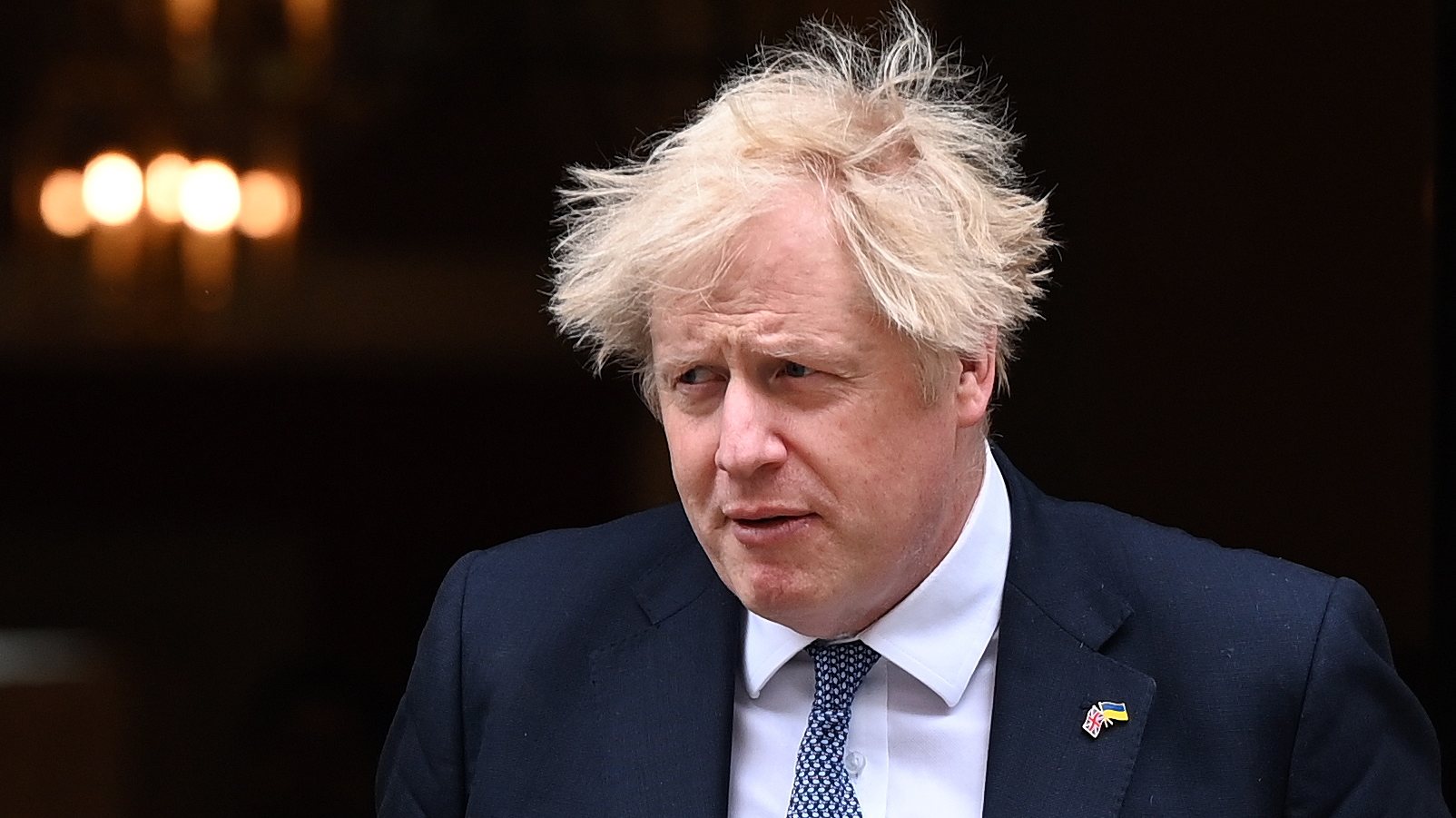 epa09976863 British Prime Minister Boris Johnson departs 10 Downing Street in London, Britain, 26 May 2022. Johnson is under pressure over &#039;party gate&#039; allegations following new photographs showing him at a drinks party during lockdown.  EPA/ANDY RAIN