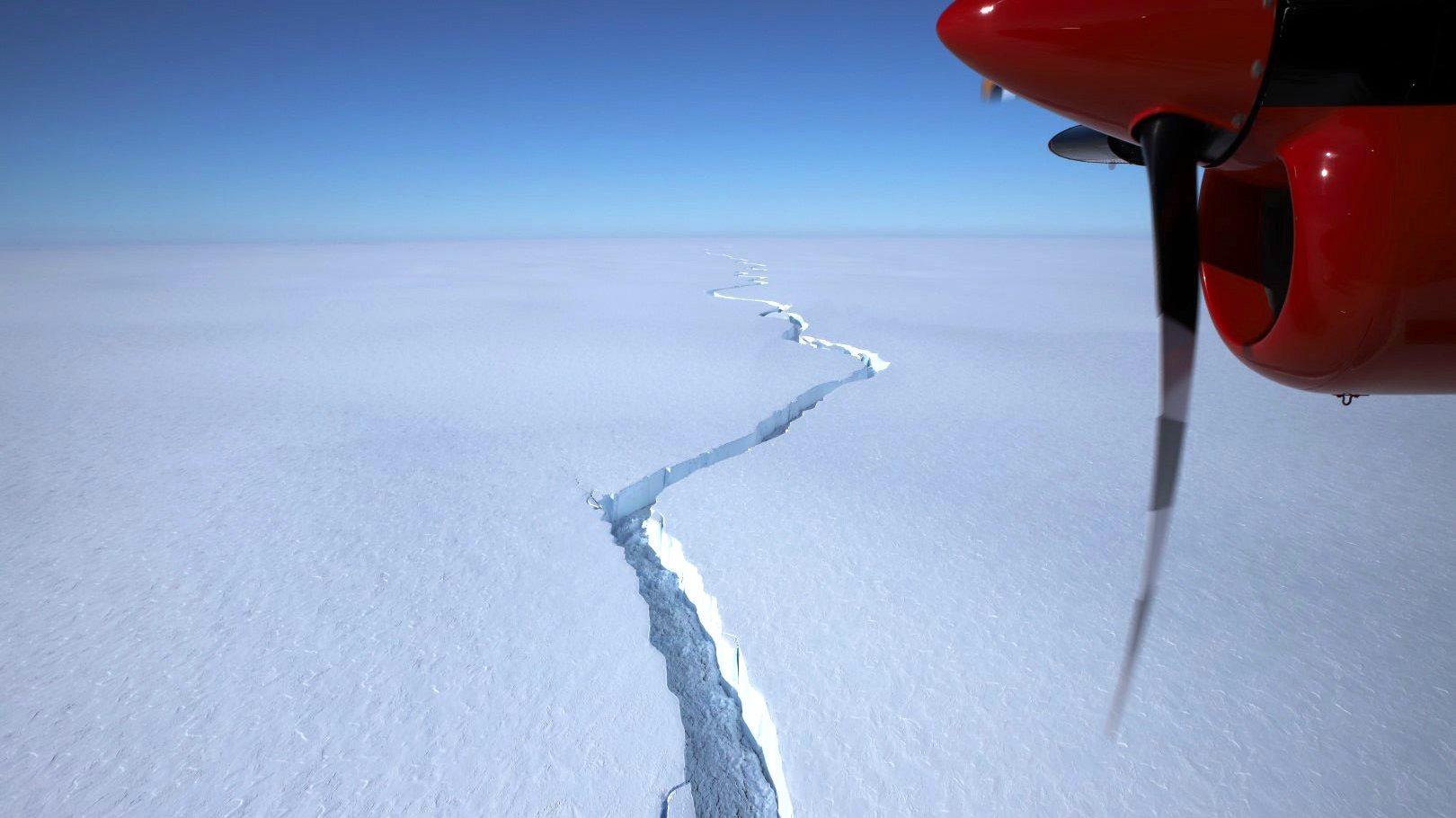 epa09044808 A handout photo made available by the British Antarctic Survey (BAS) shows a crack in the Brunt Ice Shelf during flyover on 12 January 2021 (issued 01 March 2021). An iceberg of approximately 1,270 square kilometers split from the Brunt Ice Shelf on 26 February 2021.  EPA/AVANKINTS/BAS / HANDOUT  HANDOUT EDITORIAL USE ONLY/NO SALES
