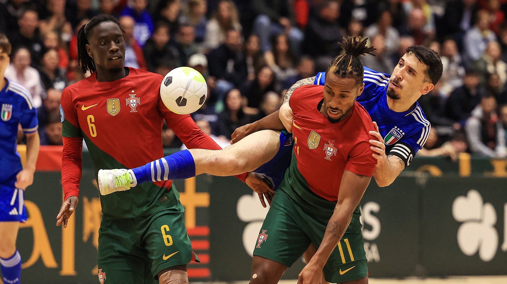 Portugal&#039;s Zicky (L) and Pany (C) in action against Italy&#039;s Carmelo Musumeci (R), during a friendly futsal match ahead of Futsal World Cup 2024 preparation, at Vila do Conde Pavillion, Porto, Portugal, 14 April 2023.JOSE COELHO/LUSA