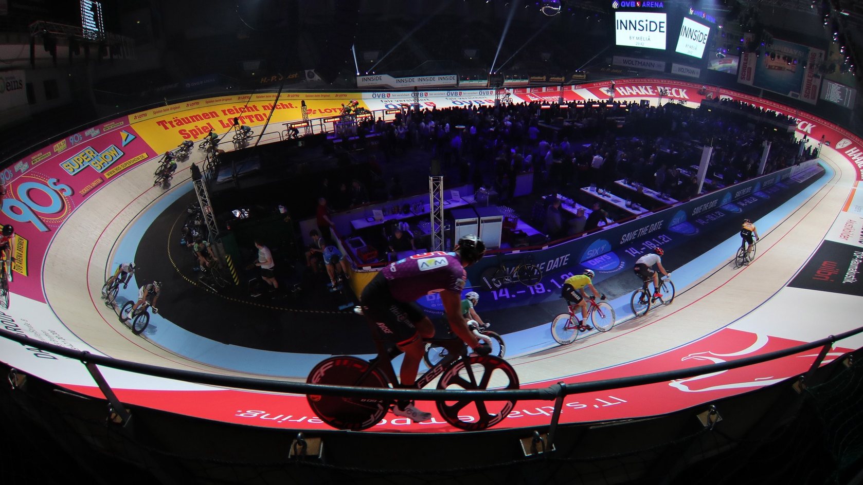 epaselect epa08614639 (FILE) - Cyclist compete on an image taken with a fisheye lens during the 56th Sixdays track cycling race in Bremen, northern Germany, 09 January 2020, re-issued 20 August 2020. In January 2021, for the first time in 57 years, there will be no Bremen six-day race. The organizers have cancelled the event due to the Corona pandemic, as reported on 20 August 2020.  EPA/FOCKE STRANGMANN *** Local Caption *** 55754772