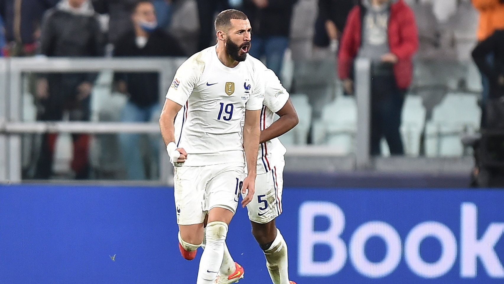 epa09512058 Karim Benzema of France celebrates after scoring during the UEFA Nations League semi final soccer match between Belgium and France in Turin, Italy, 07 October 2021.  EPA/Alessandro di Marco