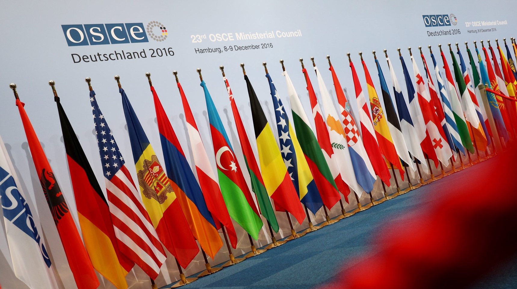 epa05663644 Flags of the OSCE member states set up in the media centre at the exhibition halls in Hamburg, Germany, 7 December 2016. According to the German foreign minsitry, 50 foreign ministers of the 57 OSCE member states have registered for the conference of the OSCE council of ministers on 8 and 9 December.  EPA/Christian Charisius