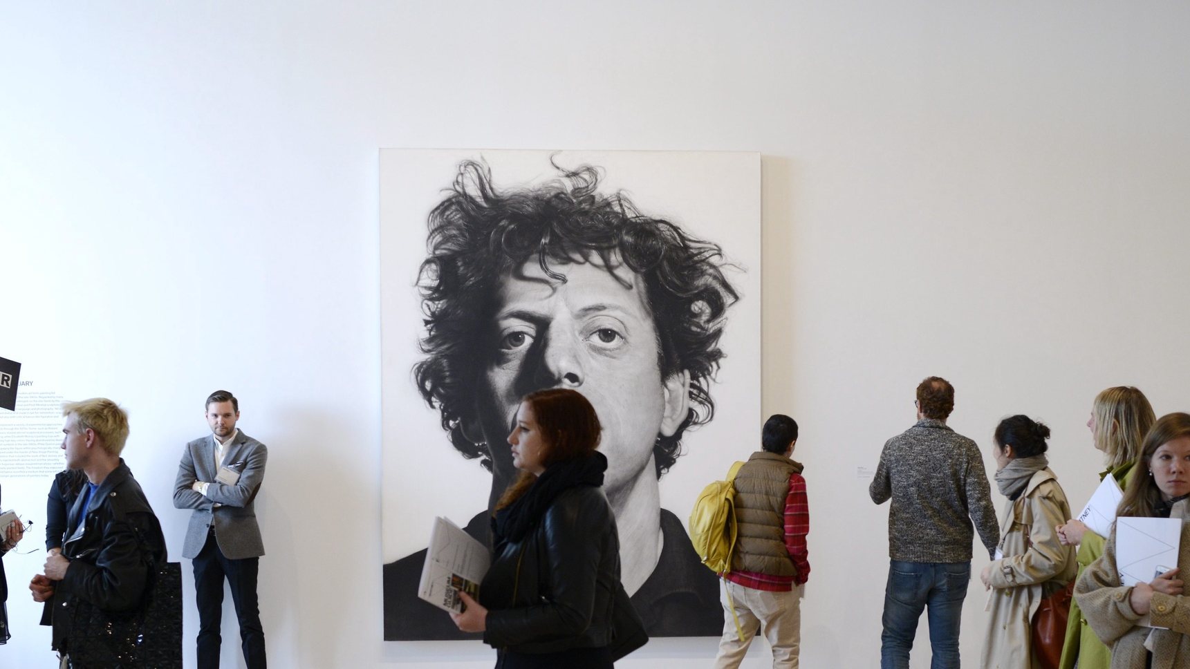 epa04717871 People look over the galleries and art, including a painting by artist Chuck Close, at the new Whitney Museum of American Art during a press preview in New York, New York, USA, 23 April 2015. The Whitney&#039;s new building, which was designed by Italian architect Renzo Piano, opens to the public on 01 May 2015.  EPA/JUSTIN LANE
