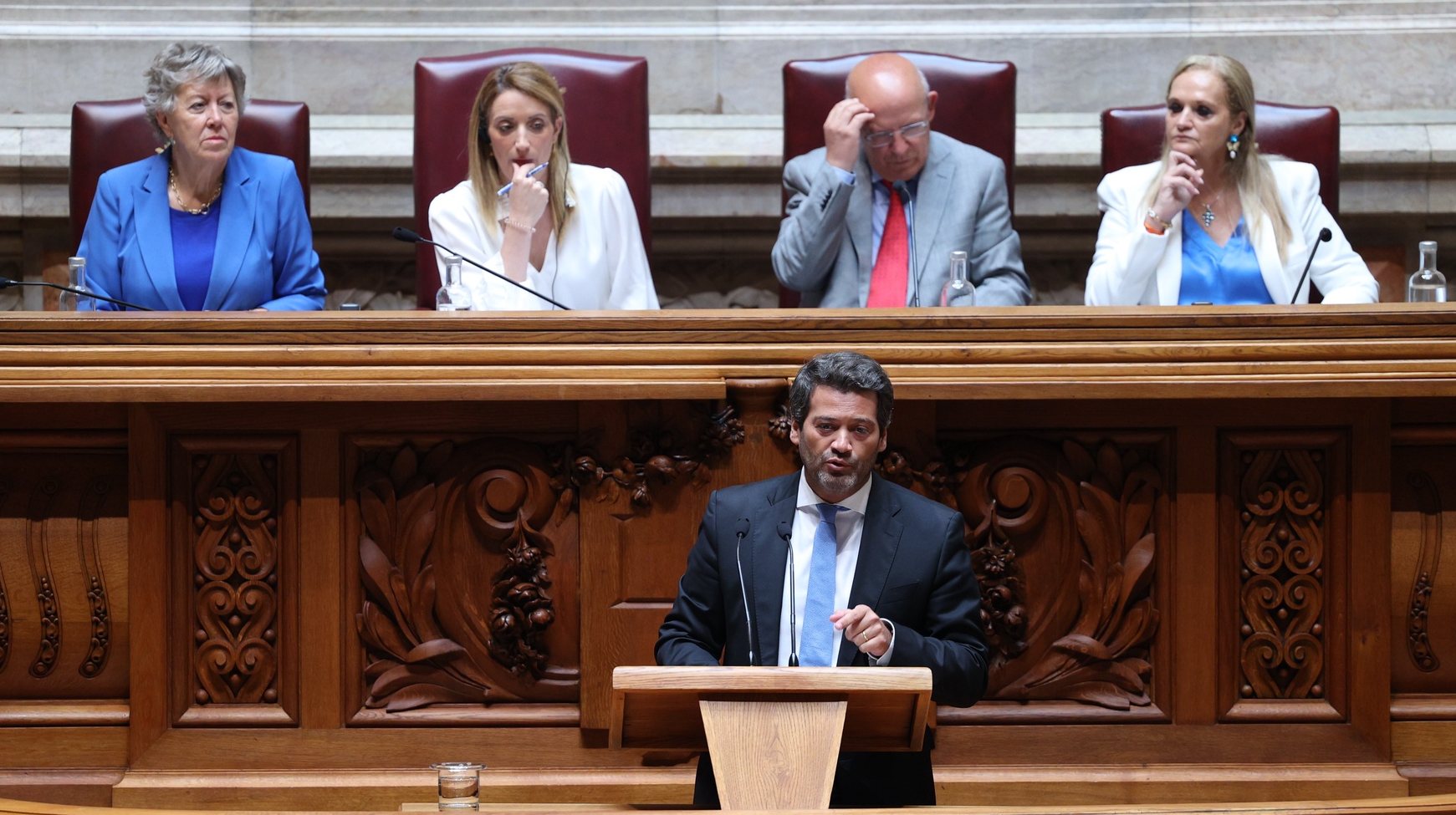 European Parliament President Roberta Metsola (2-L), flanked by her Portuguese counterpart, Augusto Santos Silva (2-R), listens to the speech of Andre Ventura, leader of Chega (Enough) Party, during her visit to the Portuguese Parliament, in Lisbon, Portugal, 16 June 2023. MIGUEL A. LOPES/LUSA