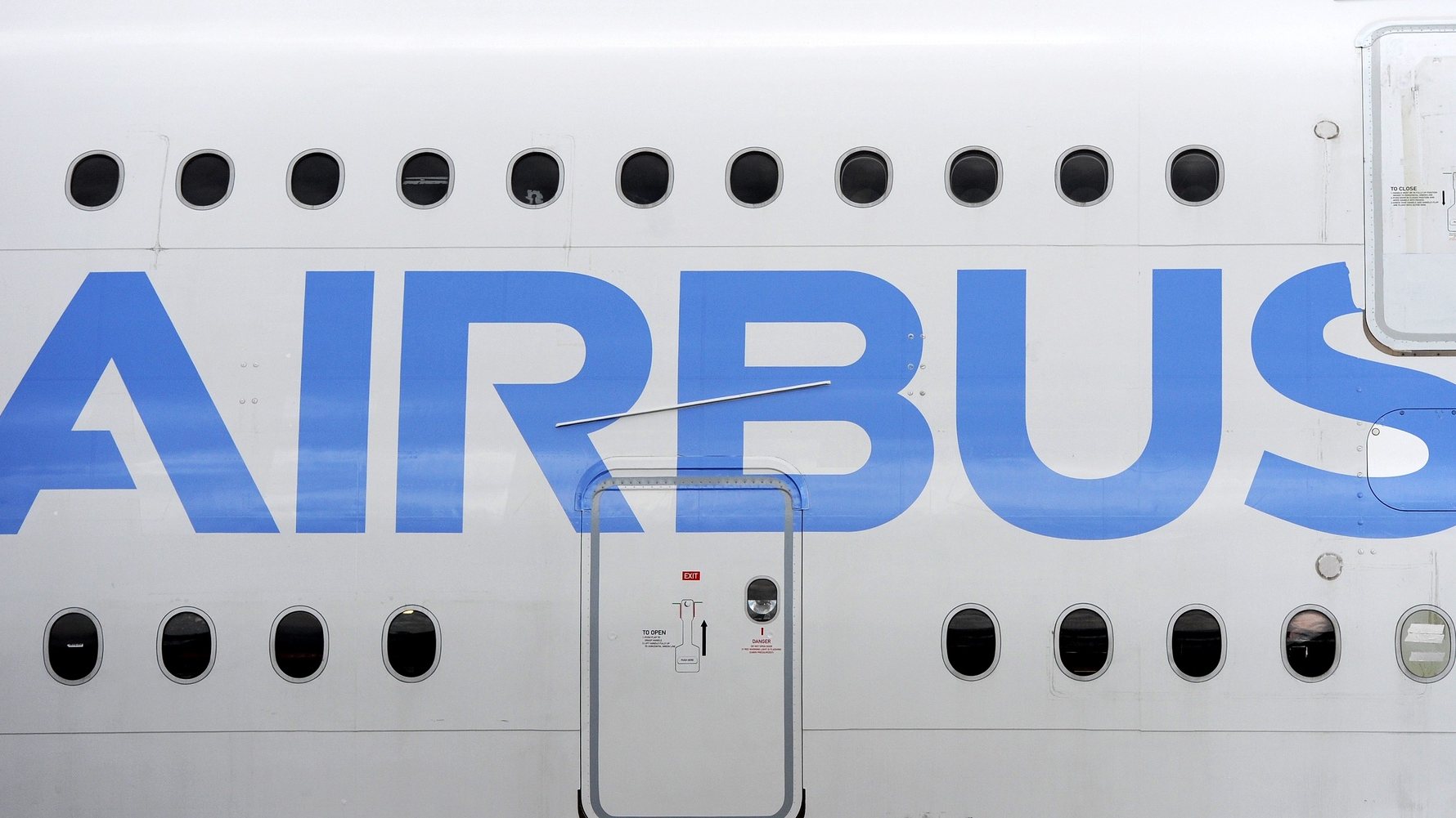 epa09017802 (FILE) - The Airbus logo on an A380 airplane at the Farnborough Airshow in Farnborough, Hampshire, south east England, 15 July 2014  (reissued 17 February 2021). Airbus will publish its financial year 2020 results on 18 February 2021.  EPA/ANDY RAIN *** Local Caption *** 56459604