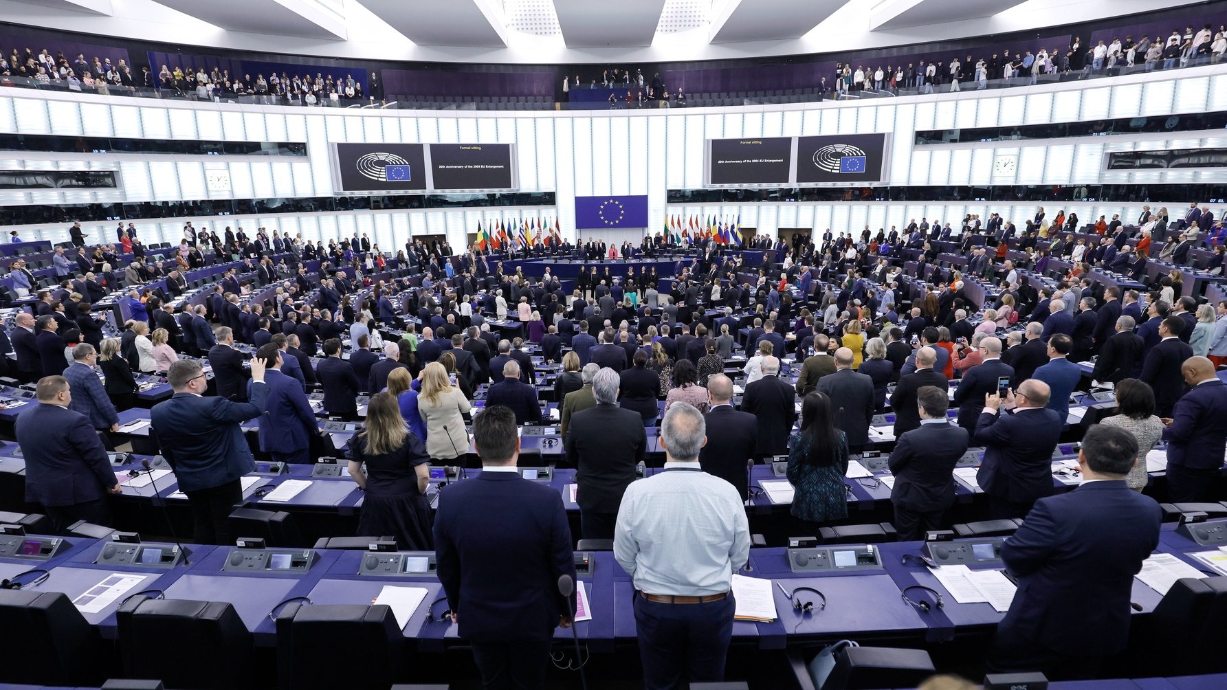 epaselect epa11297741 Members of the European Parliament stand as they listen to the European anthem during a formal sitting on the 20th anniversary of the 2004 EU Enlargement at the European Parliament in Strasbourg, France, 24 April 2024. The EU Parliament&#039;s current plenary session runs from 22 until 25 April 2024.  EPA/RONALD WITTEK