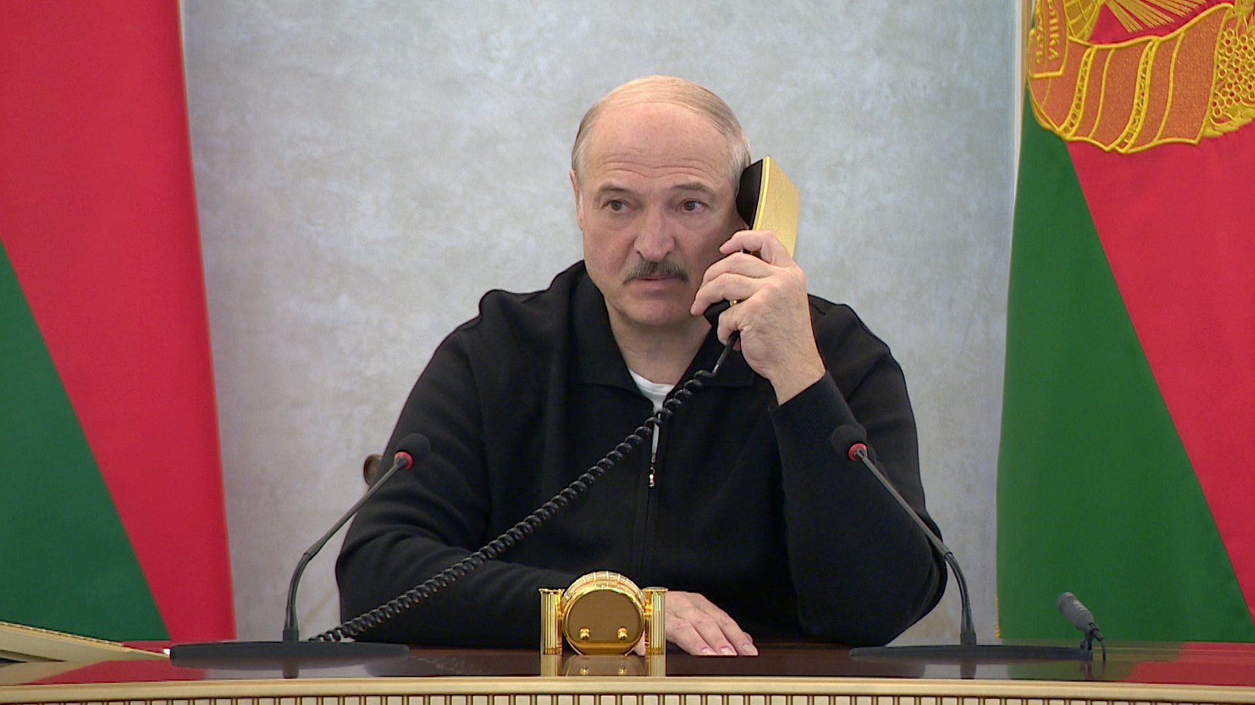 epa08622634 Belarusian President Alexander Lukashenko speaks on the phone at the Palace of Independence in Minsk, Belarus, 23 August 2020 (Issued 24 August 2020).  EPA/BELTA / POOL