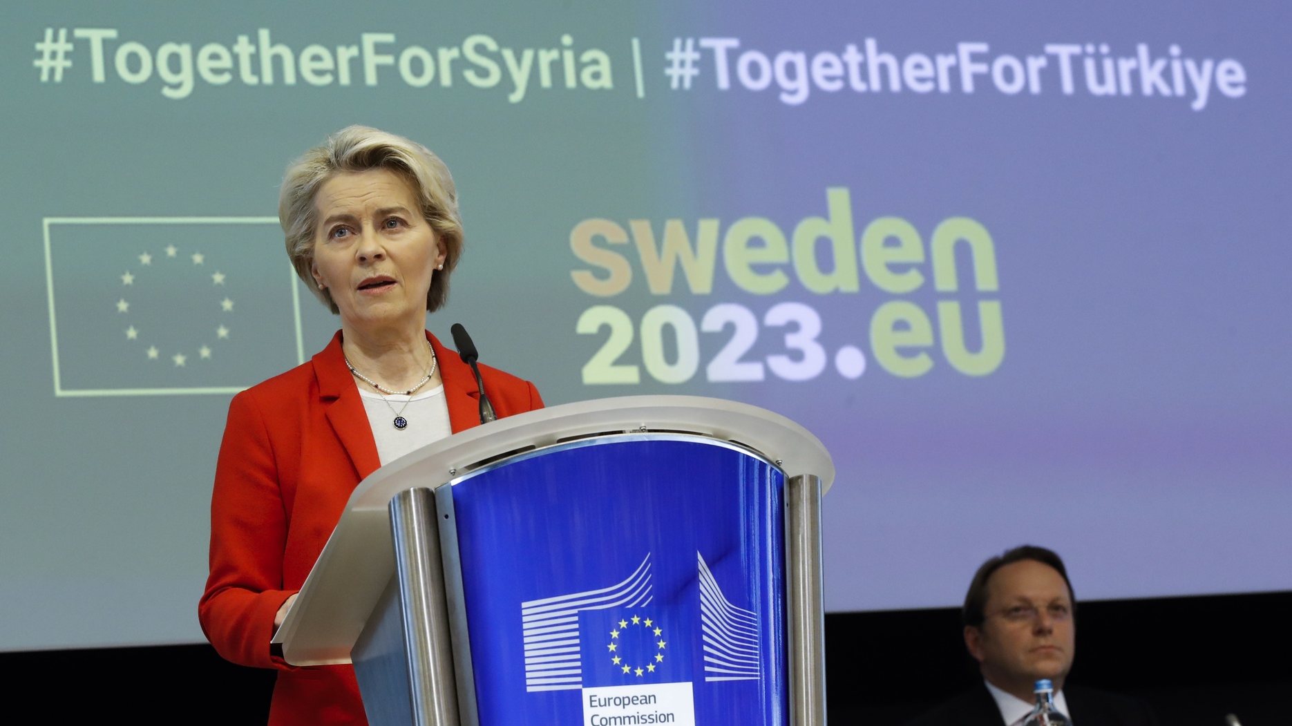 epa10533584 European Commission President Ursula von der Leyen (L) delivers a speech at the opening of an international donors&#039; conference in support of the people in earthquake stricken regions in Turkey and Syria, in Brussels, Belgium, 20 March 2023. More than 50,000 people died and thousands more were injured after major earthquakes struck southern Turkey and northern Syria on 06 February and again on 20 February 2023. Hundreds of thousands were left homeless.  EPA/OLIVIER HOSLET