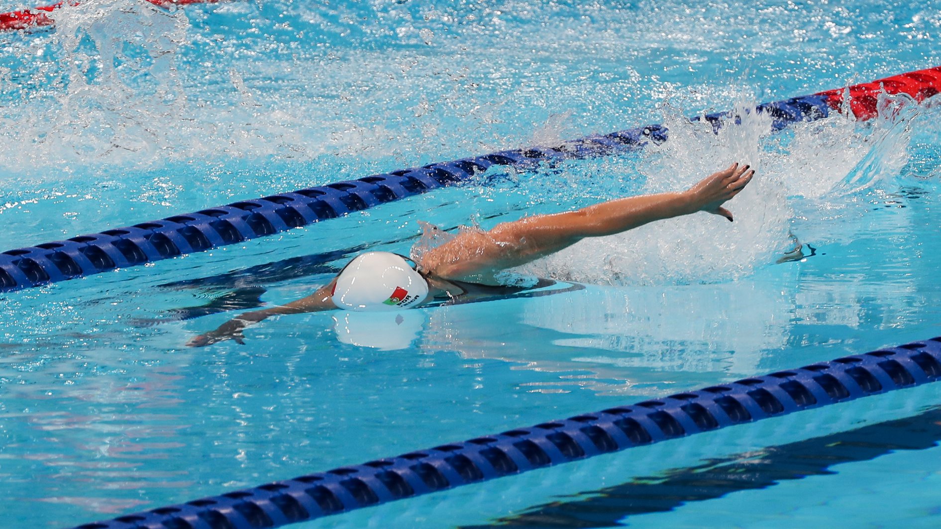 A nadadora Portuguesa, Susana Veiga em ação na prova feminina de natação de 50 metros livres S10 esta manhã no Centro Aquatico de Tóquio, nos jogos Paralímpicos de Toquio 2020, Japão, 25 de agosto de 2021. MIGUEL A. LOPES/LUSA